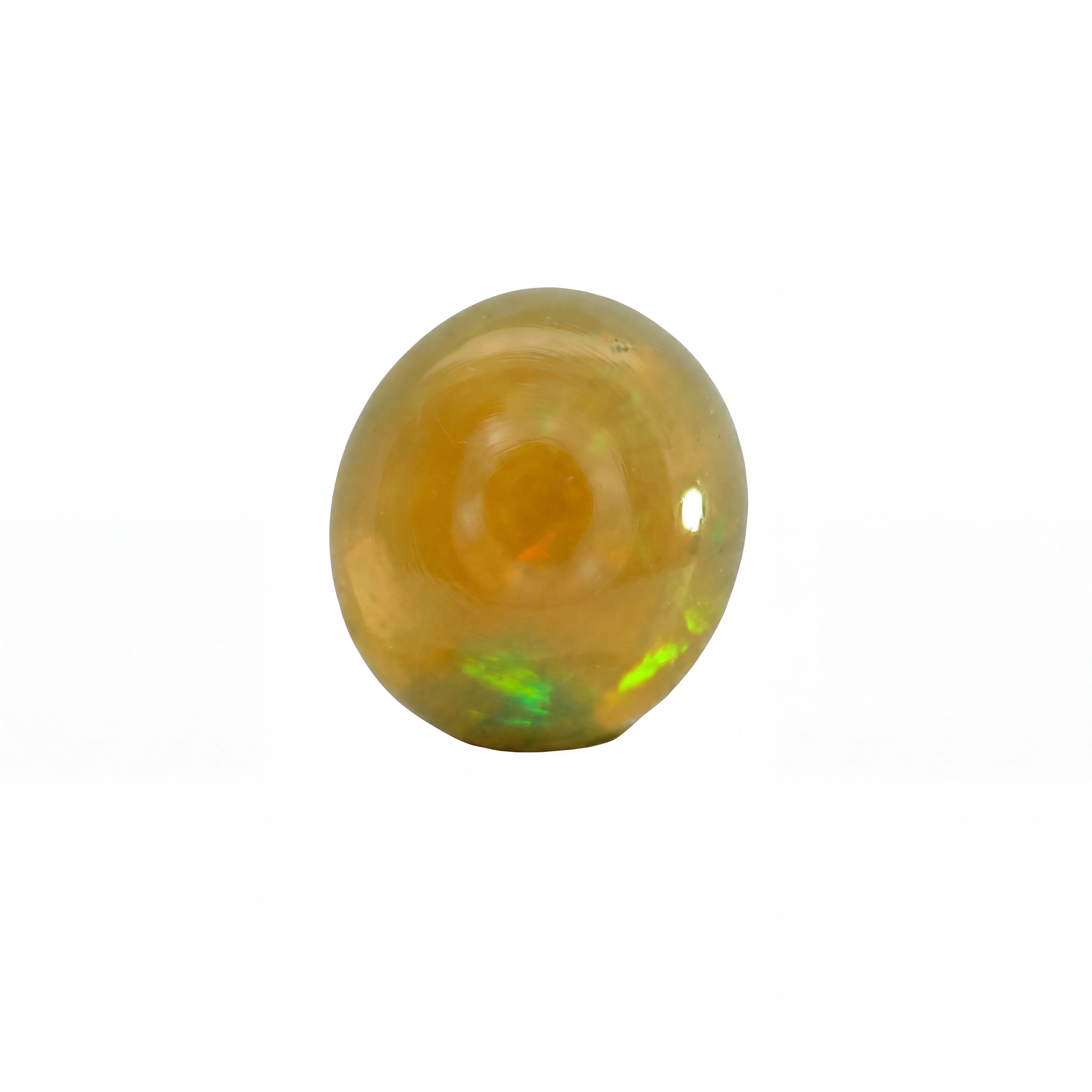 A single round cabochon gemstone with a warm golden-brown body and a vibrant green iridescent play-of-colour near the base, shown on a plain white background.