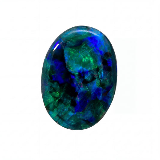 An oval-cut labradorite gemstone displaying vibrant blue, green, and black iridescent play-of-colour, isolated on a solid white background.