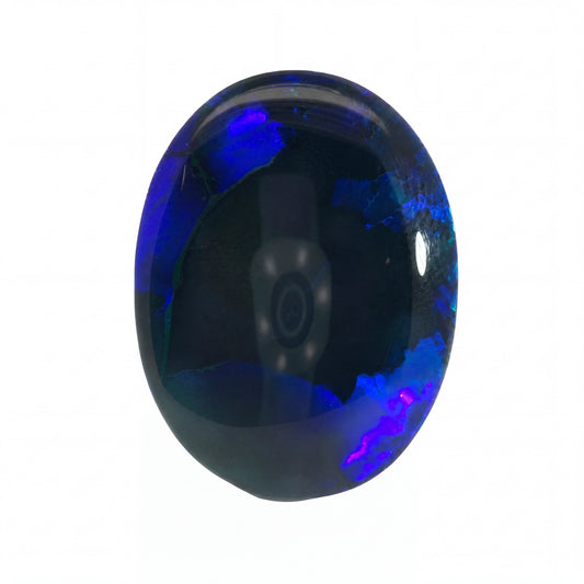 A polished oval cabochon gemstone featuring a deep blue to black base with vibrant iridescent blue and purple flashes, shown on a plain white background.