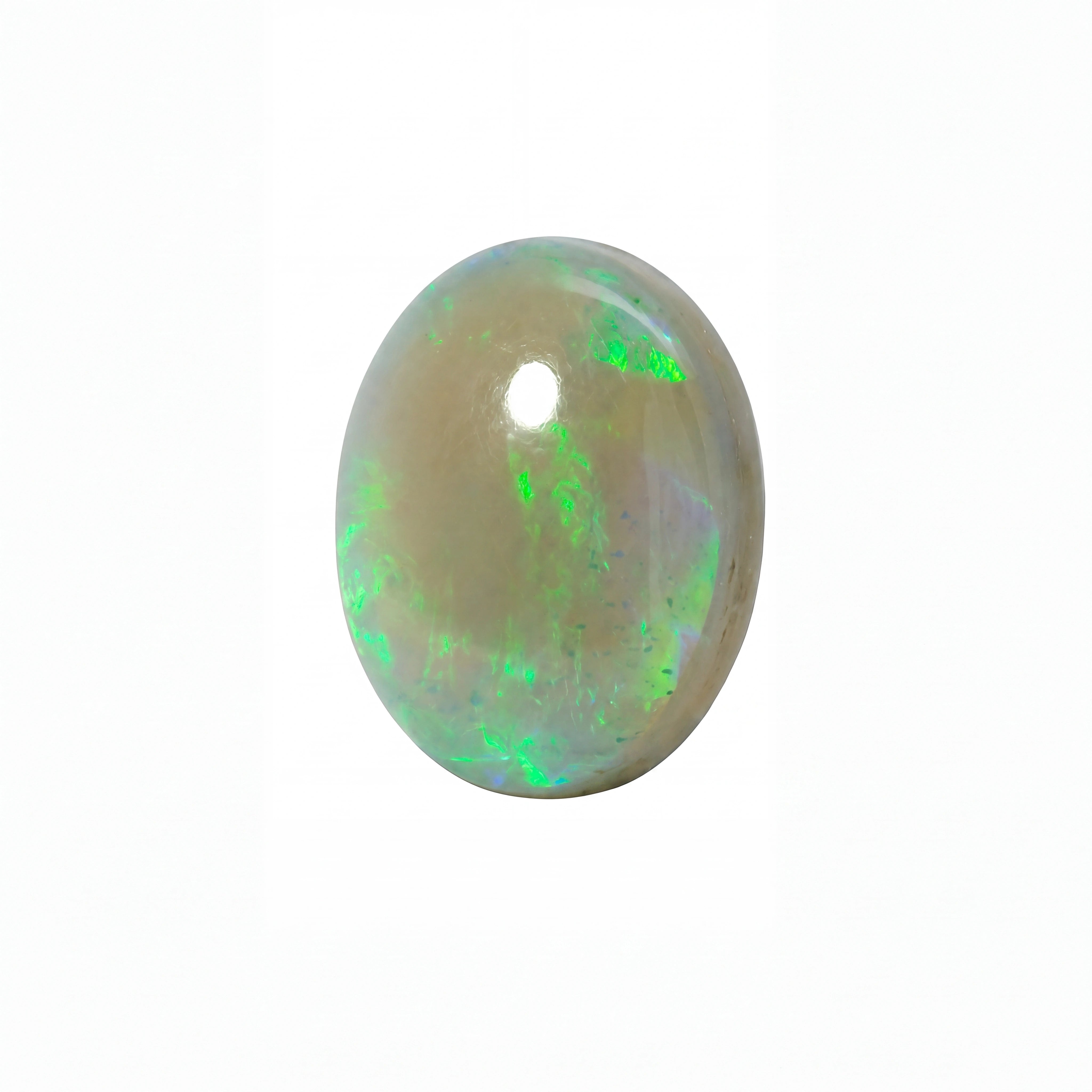 A polished oval cabochon opal gemstone displaying a mix of cream, grey, and vibrant green iridescent flashes, set against a plain white background.