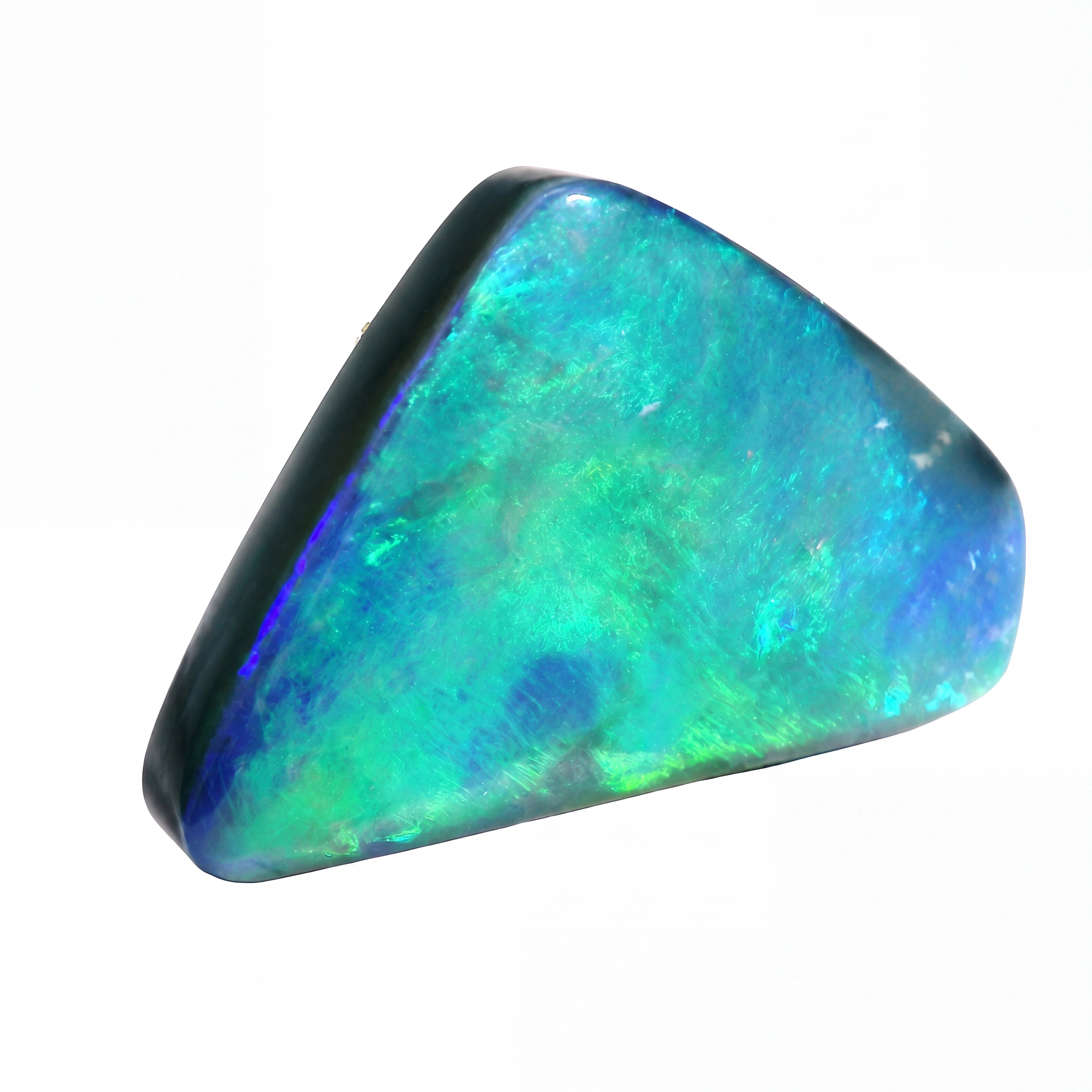 A polished triangular opal stone with vibrant blue, green, and turquoise iridescent colours, set against a plain white background.