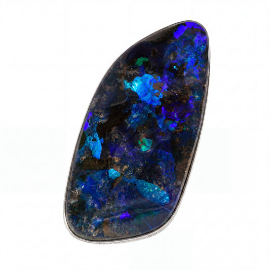 A teardrop-shaped black opal gemstone with vibrant blue, purple, and green flashes, set in a silver bezel on a white background.