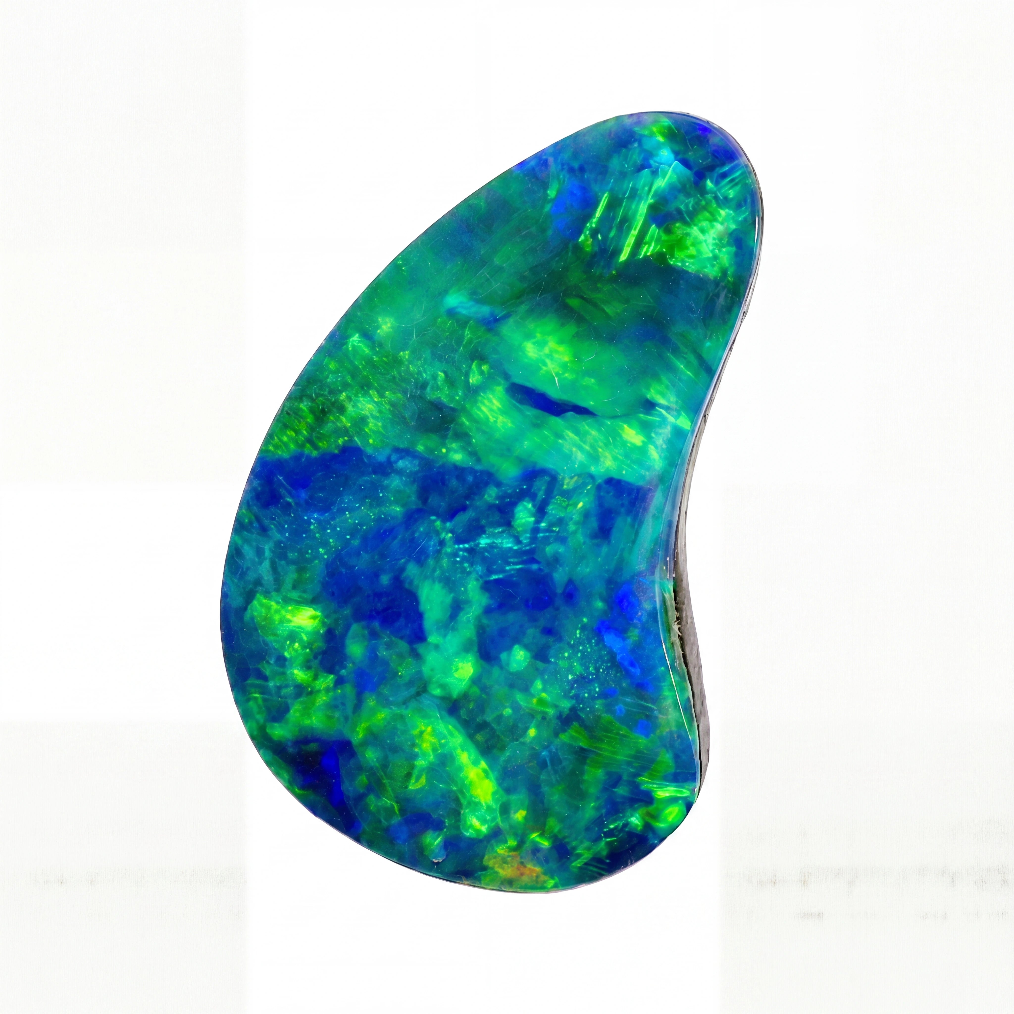 A teardrop-shaped loose opal gemstone with vibrant green, blue, and purple iridescent play-of-colour on a plain white background.