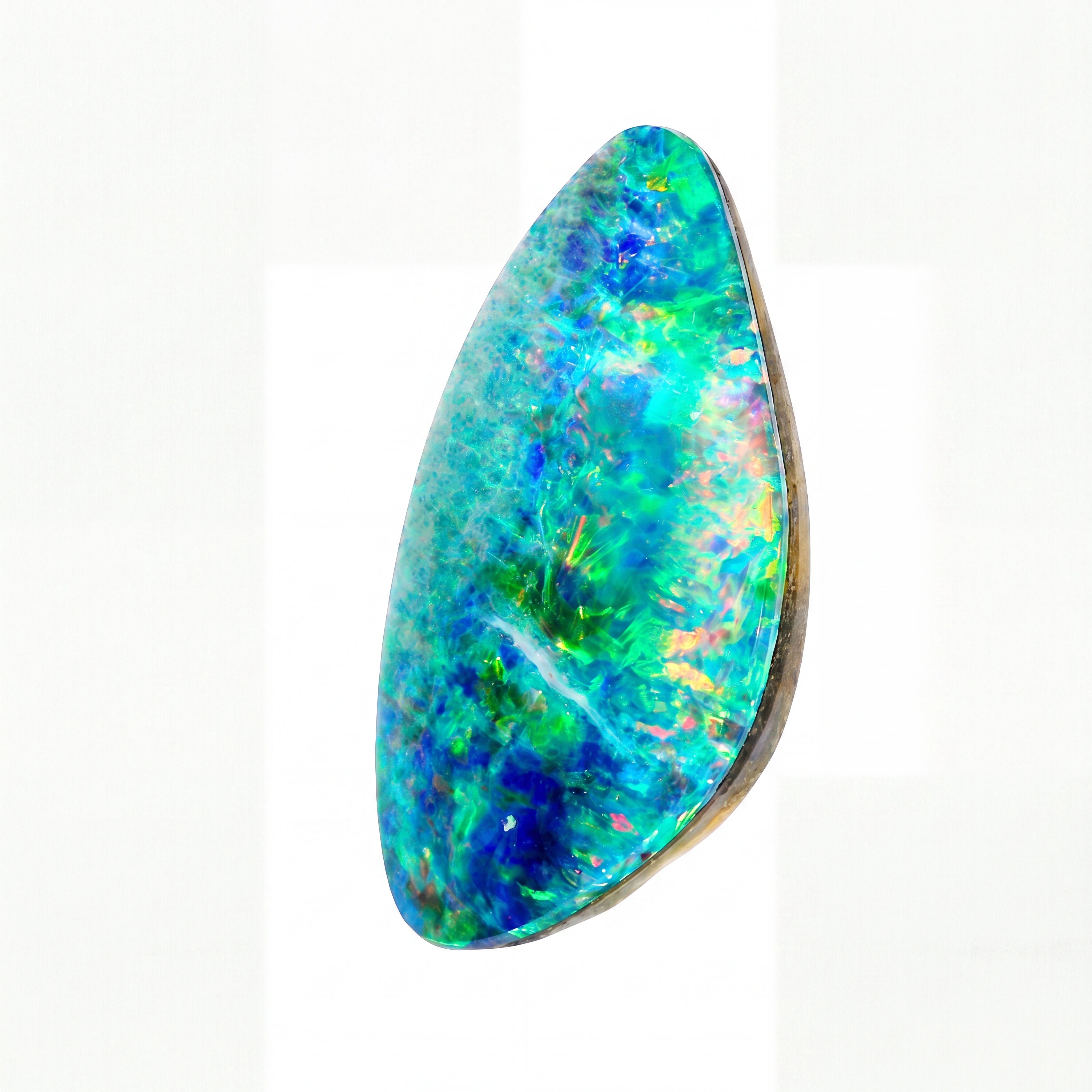 A teardrop-shaped natural opal gemstone with vibrant blue, green, and turquoise iridescent colours, set in a polished dark metal bezel on a white background.