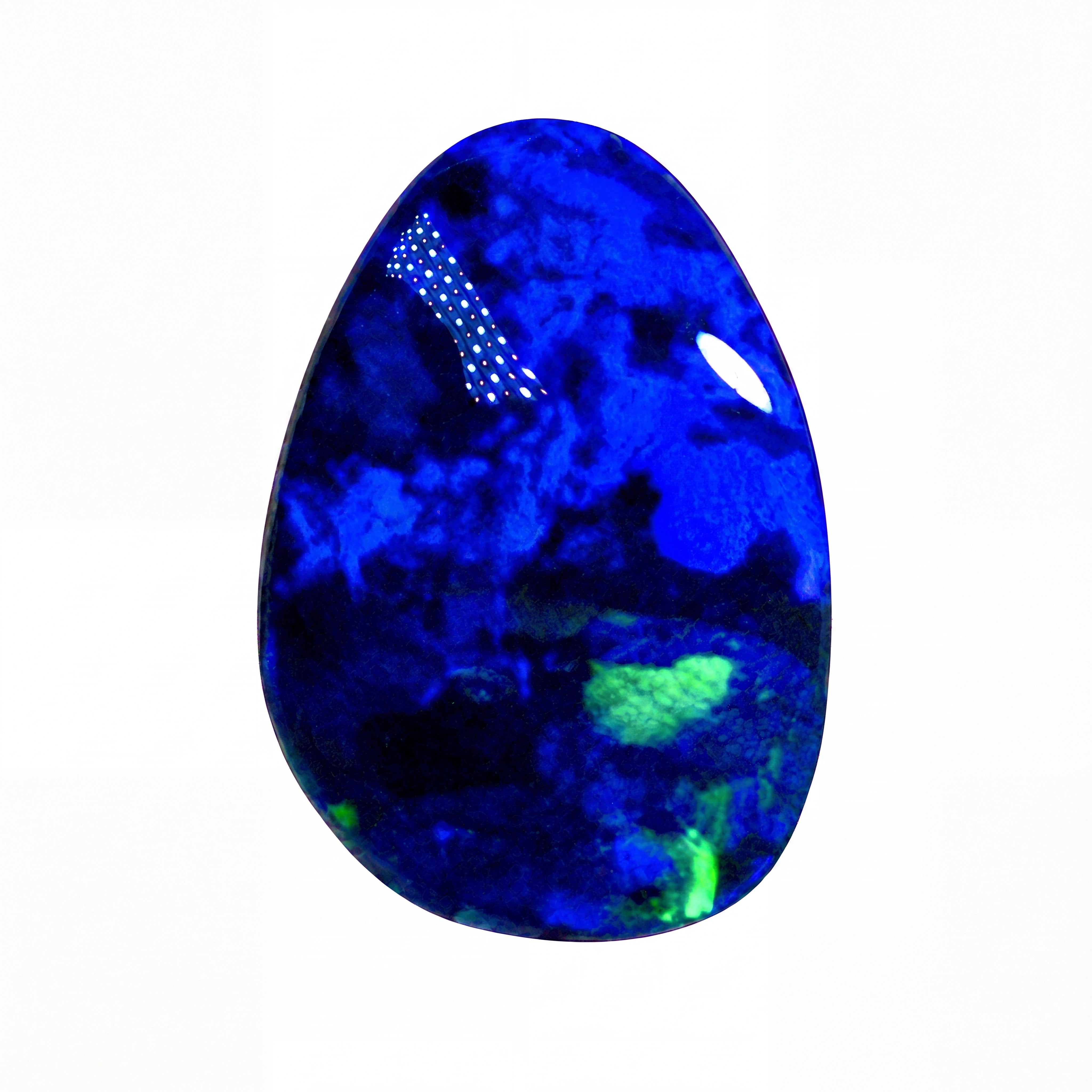 A polished oval cabochon gemstone with vibrant blue and green iridescent play-of-colour, displayed against a solid black background.