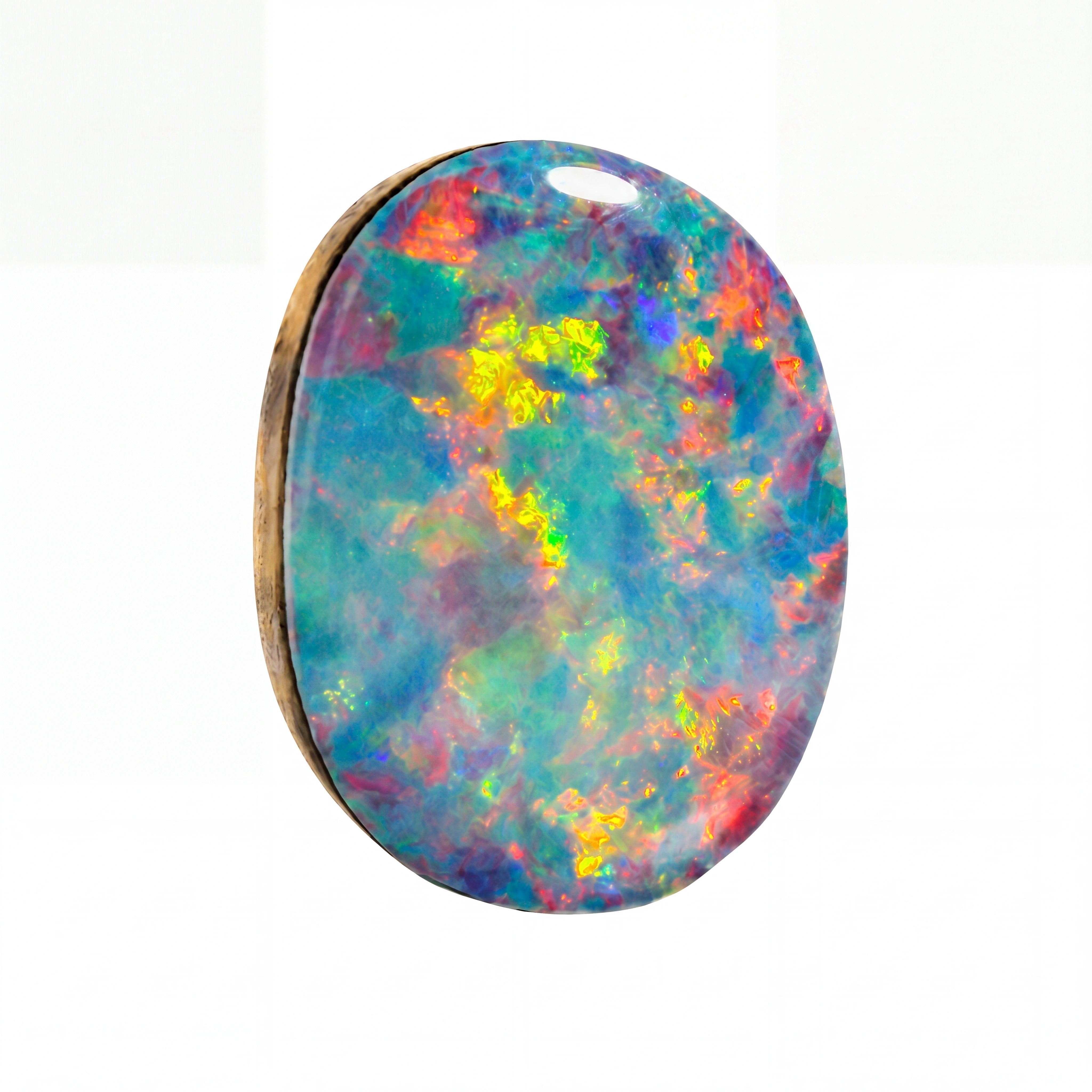 An oval-shaped cabochon opal gemstone pendant with a natural wood backing, showcasing a vibrant play-of-colour pattern with blue, green, yellow, orange, and red hues on a white background.