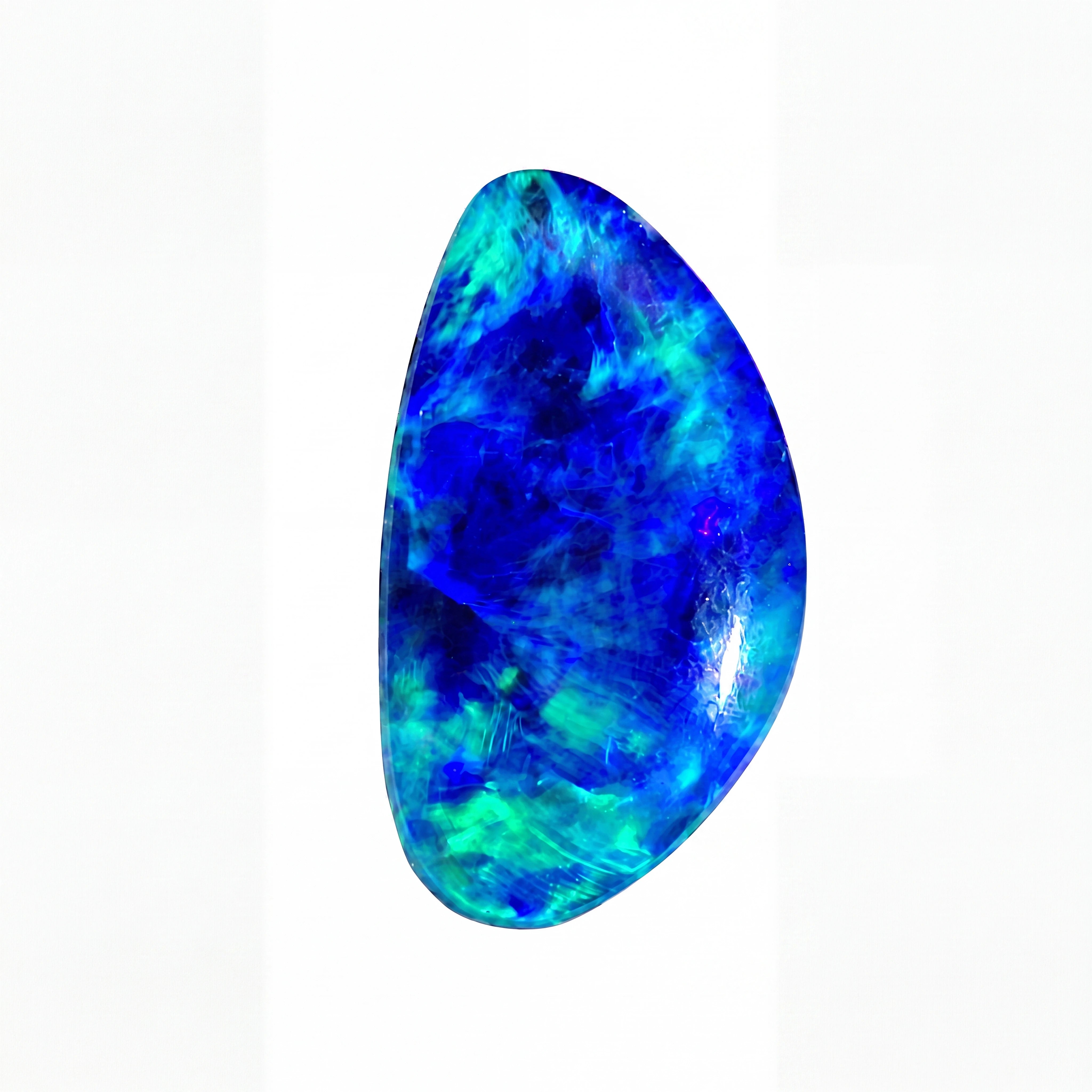 A polished teardrop-shaped cabochon gemstone featuring vibrant blue and green opalescent play-of-colour, displayed on a clean white background.