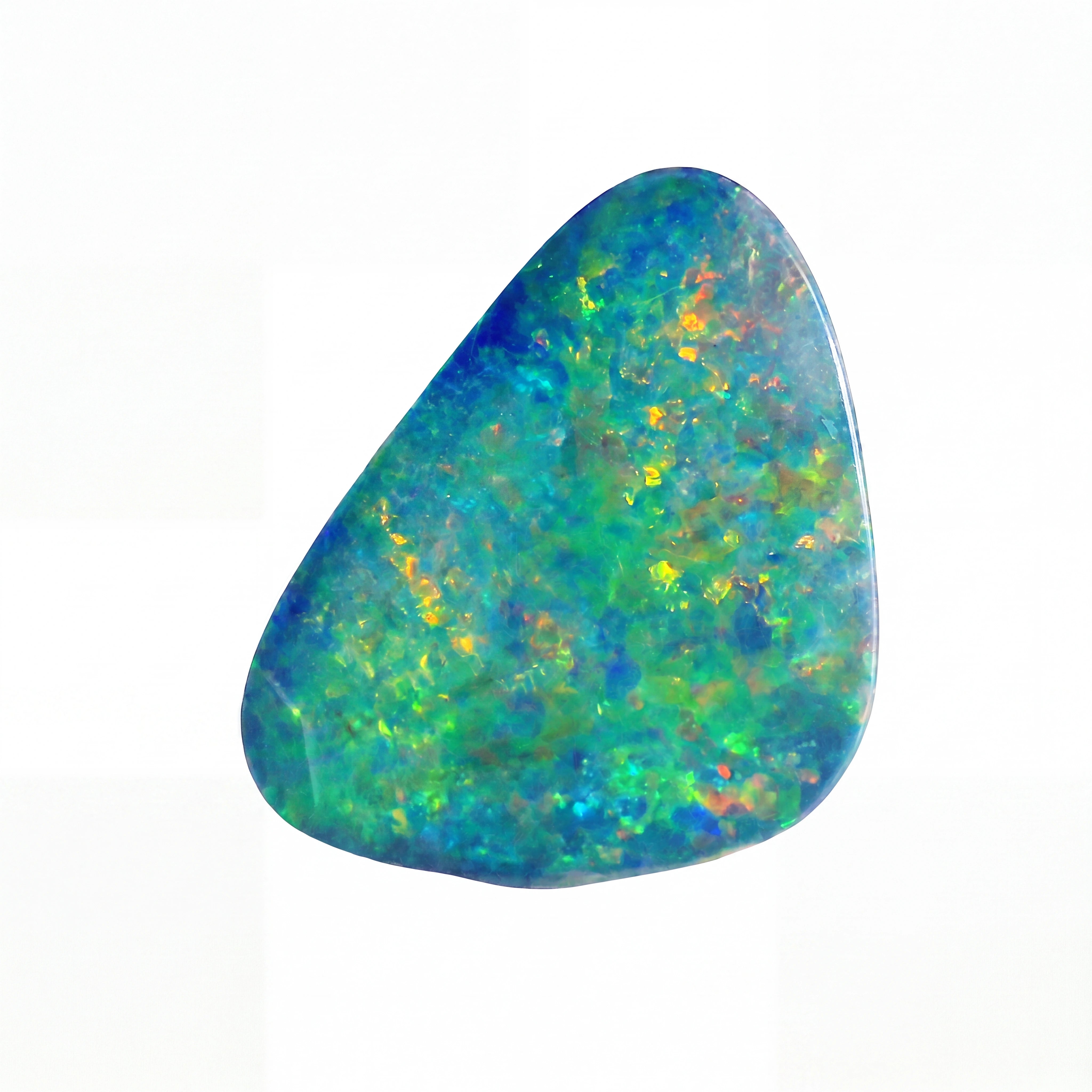 A polished irregular-shaped opal gemstone displaying vibrant iridescent colours including green, blue, orange, and yellow against a solid white background.