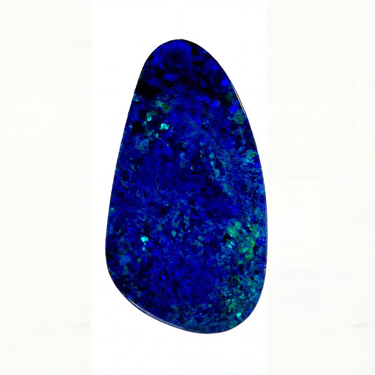 A teardrop-shaped blue opal gemstone with vibrant deep blue and green iridescent flashes, displayed on a clean white background.