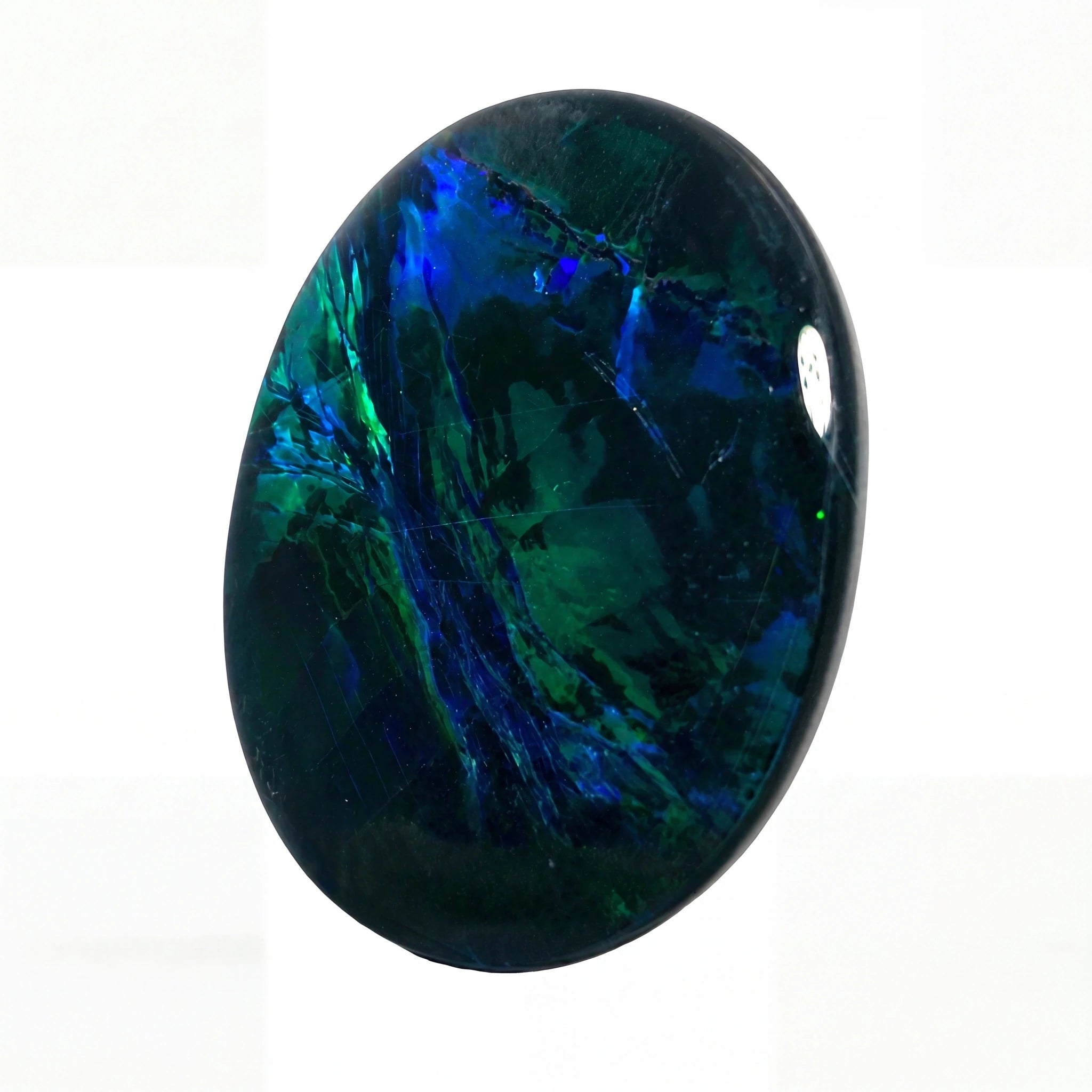 A polished oval cabochon gemstone featuring a deep blue and green opal-like play-of-colour pattern on a white background.