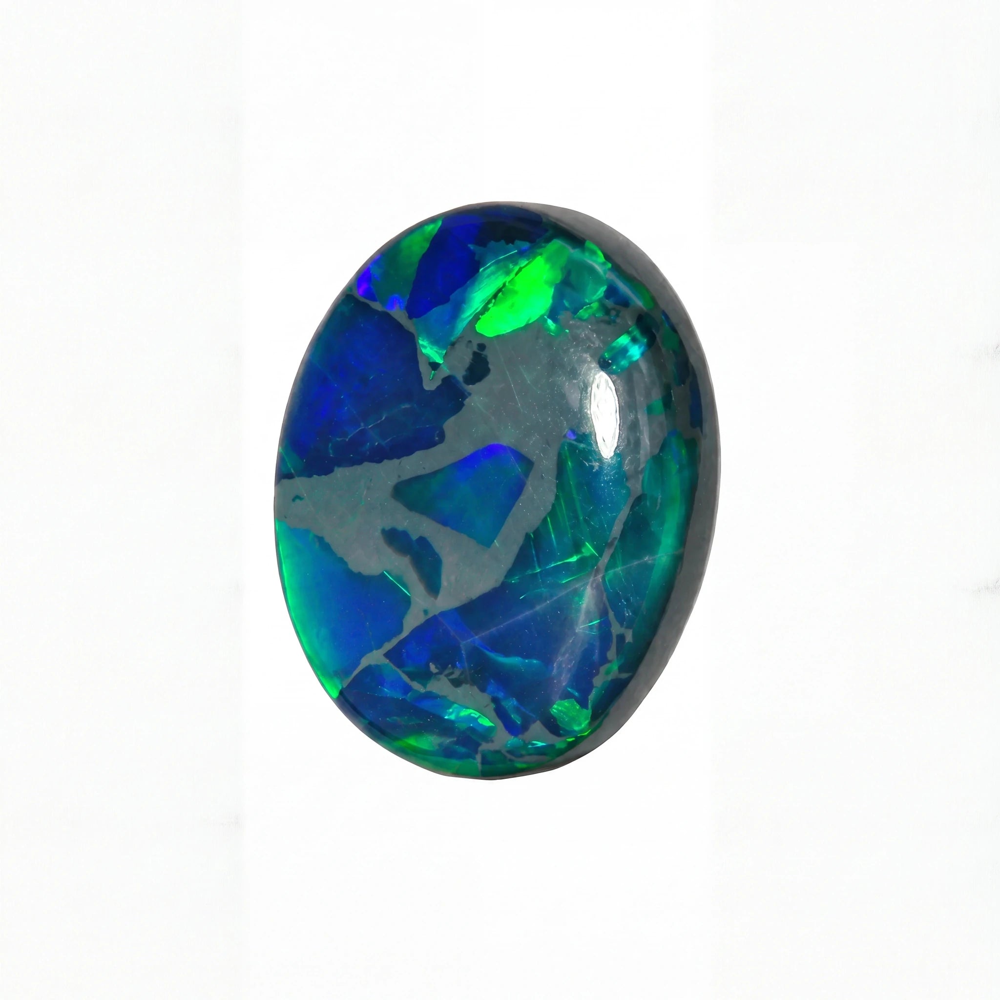 A polished oval cabochon gemstone showing vibrant iridescent play-of-colour with blue, green, and purple flashes against a dark base, set against a plain white background.