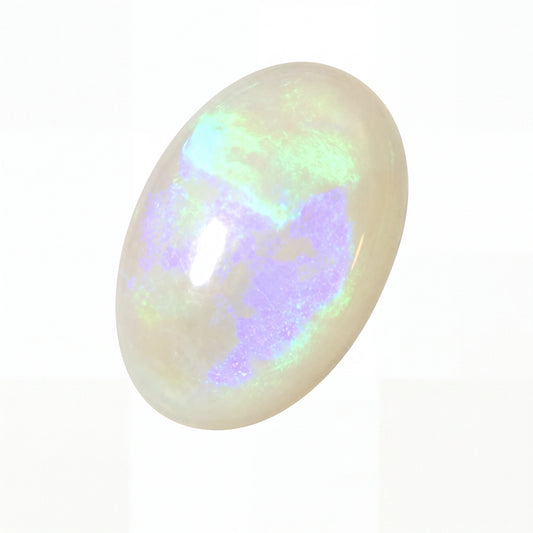 Opal stone with multicoloured play of light on a white background