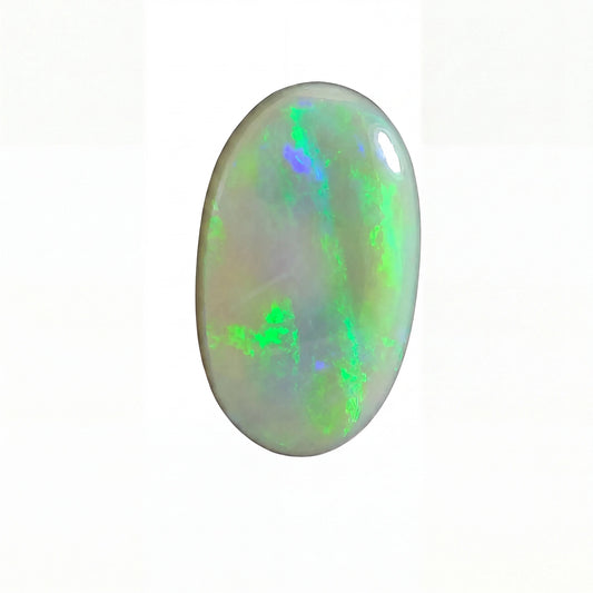 Oval-shaped opal gemstone with green and blue fluorescence on a white background