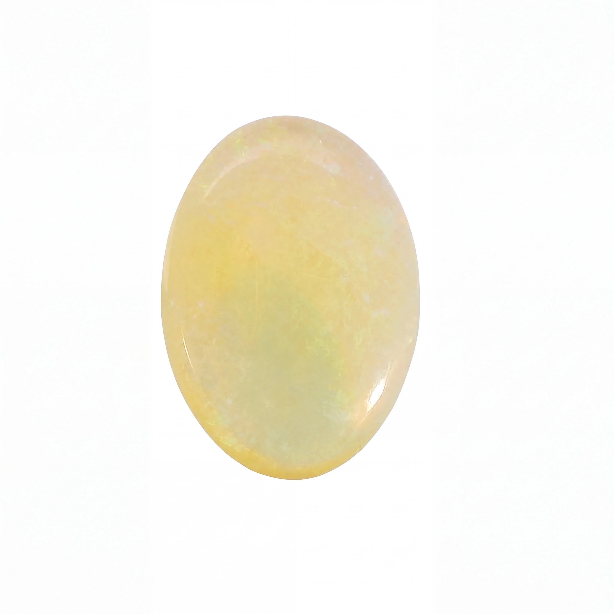 A single oval cabochon gemstone with a soft yellow and pale green iridescent colouration, shown on a plain white background.