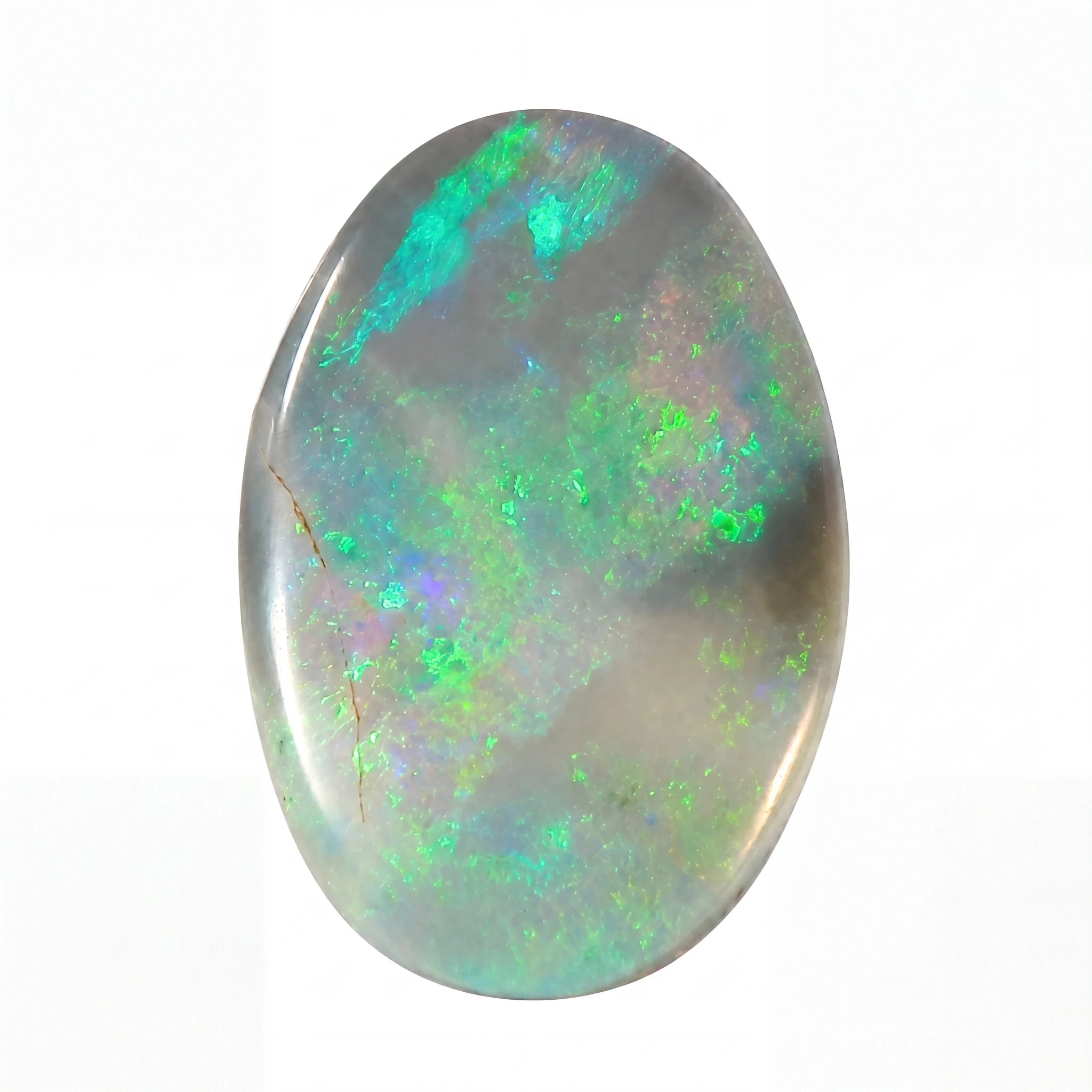 Oval-shaped opal stone with green and blue fluorescence on a white background