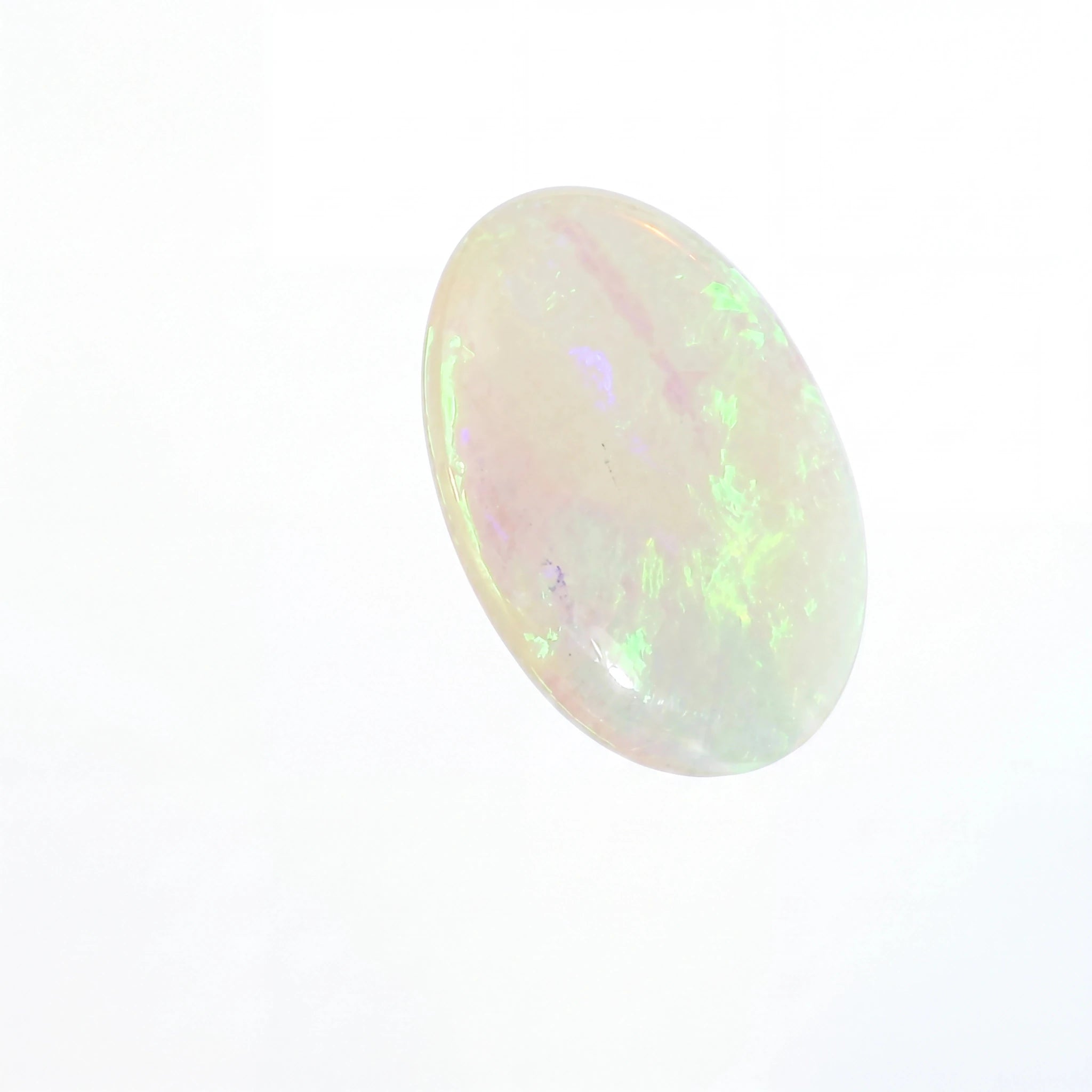A single oval cabochon gemstone with a milky white base and iridescent flashes of green, pink, and blue, shown on a plain white background.
