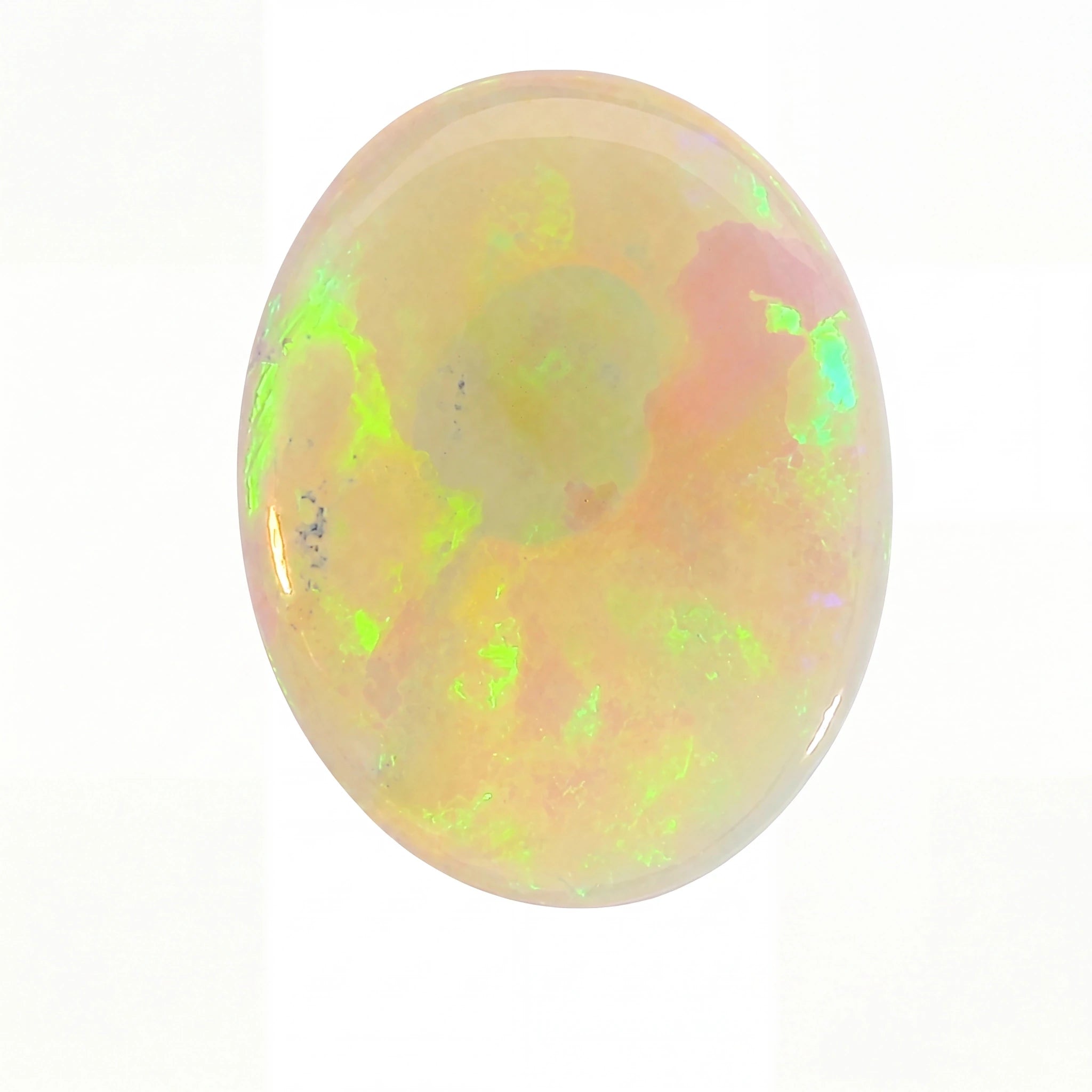 A polished oval cabochon gemstone showing a play-of-colour mix of pale yellow, peach, pink, and bright neon green on a white background.