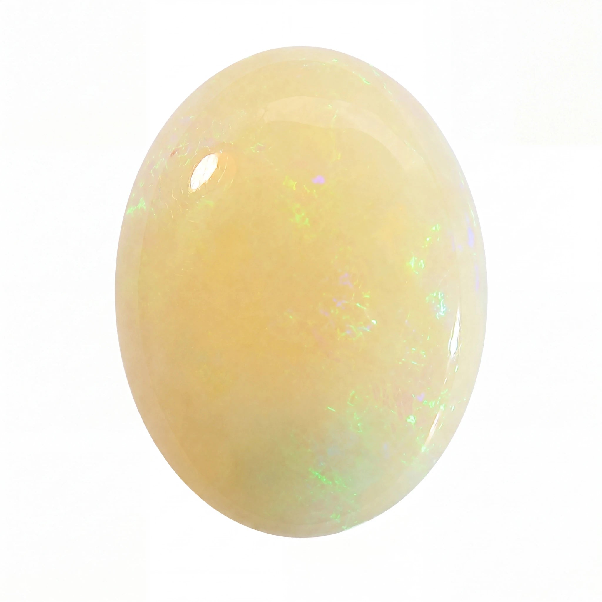 A polished oval cabochon gemstone with a creamy pale yellow body and subtle iridescent flashes of green and blue, shown on a plain white background.