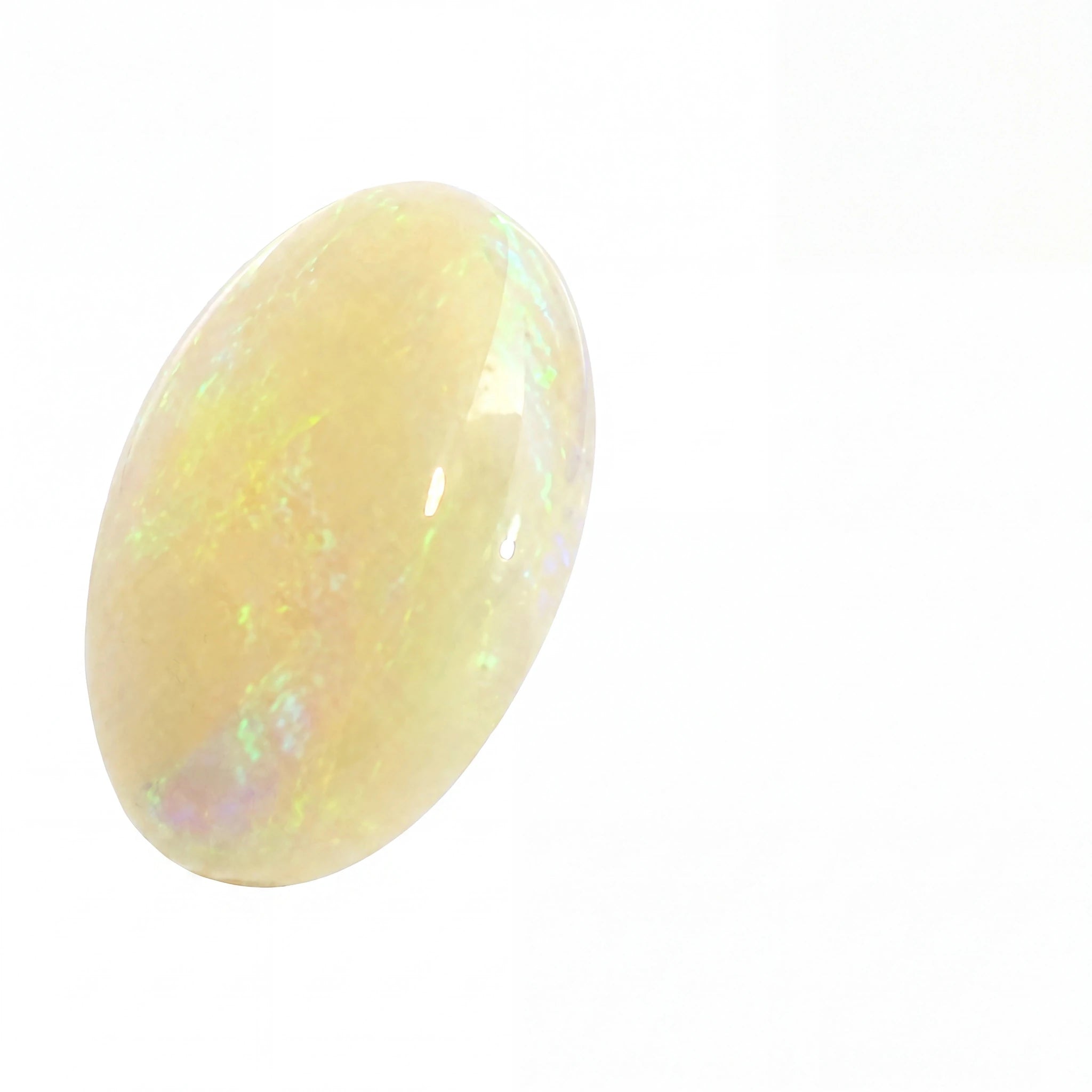 A polished oval cabochon gemstone with a creamy yellow body and subtle iridescent flashes of green, blue, and pink, shown on a plain white background.