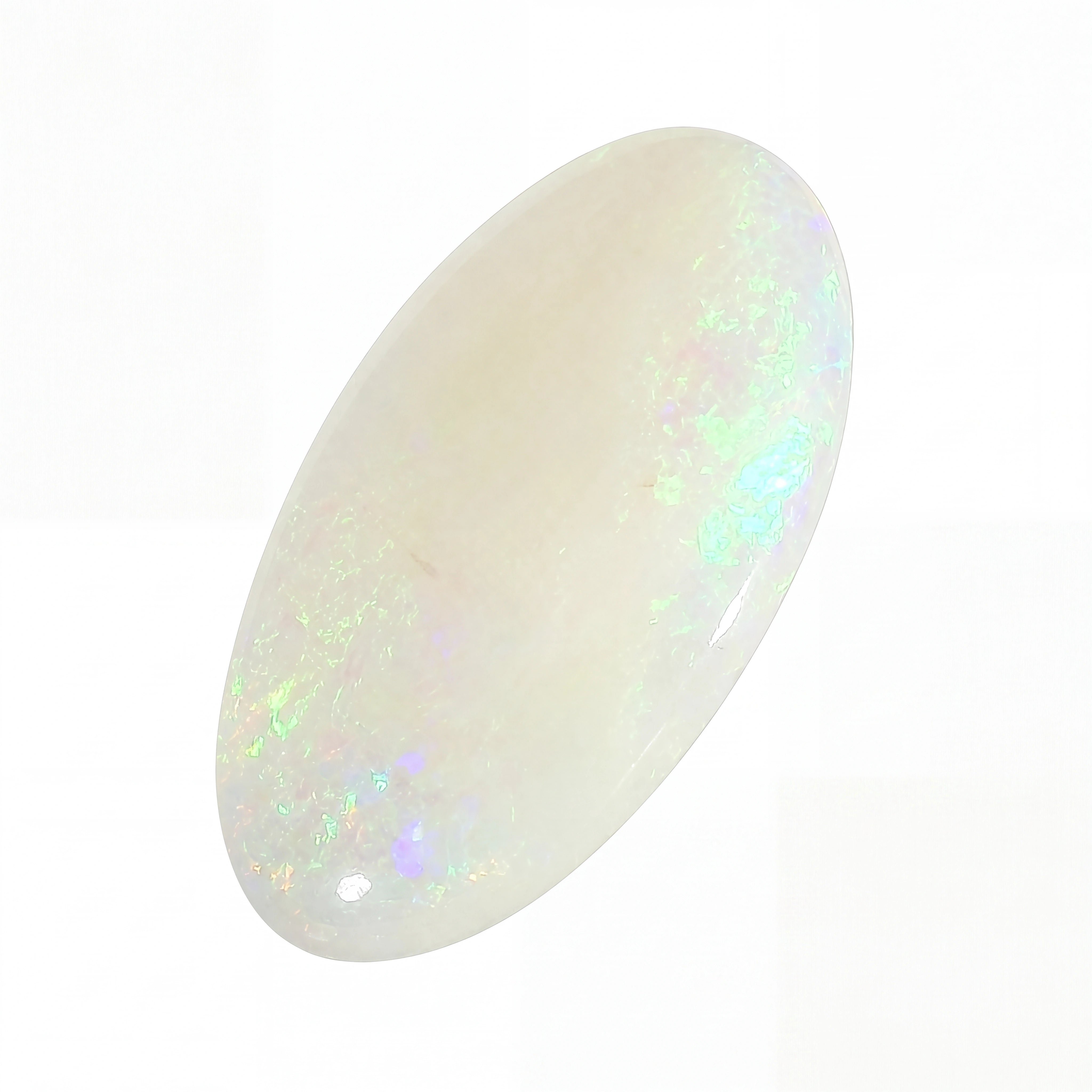 Opal stone with multicoloured flash on a white background