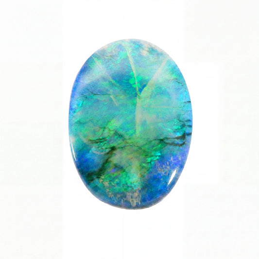 An oval cabochon gemstone featuring vibrant iridescent colours of blue, green, and teal with natural marbling, set against a plain white background.