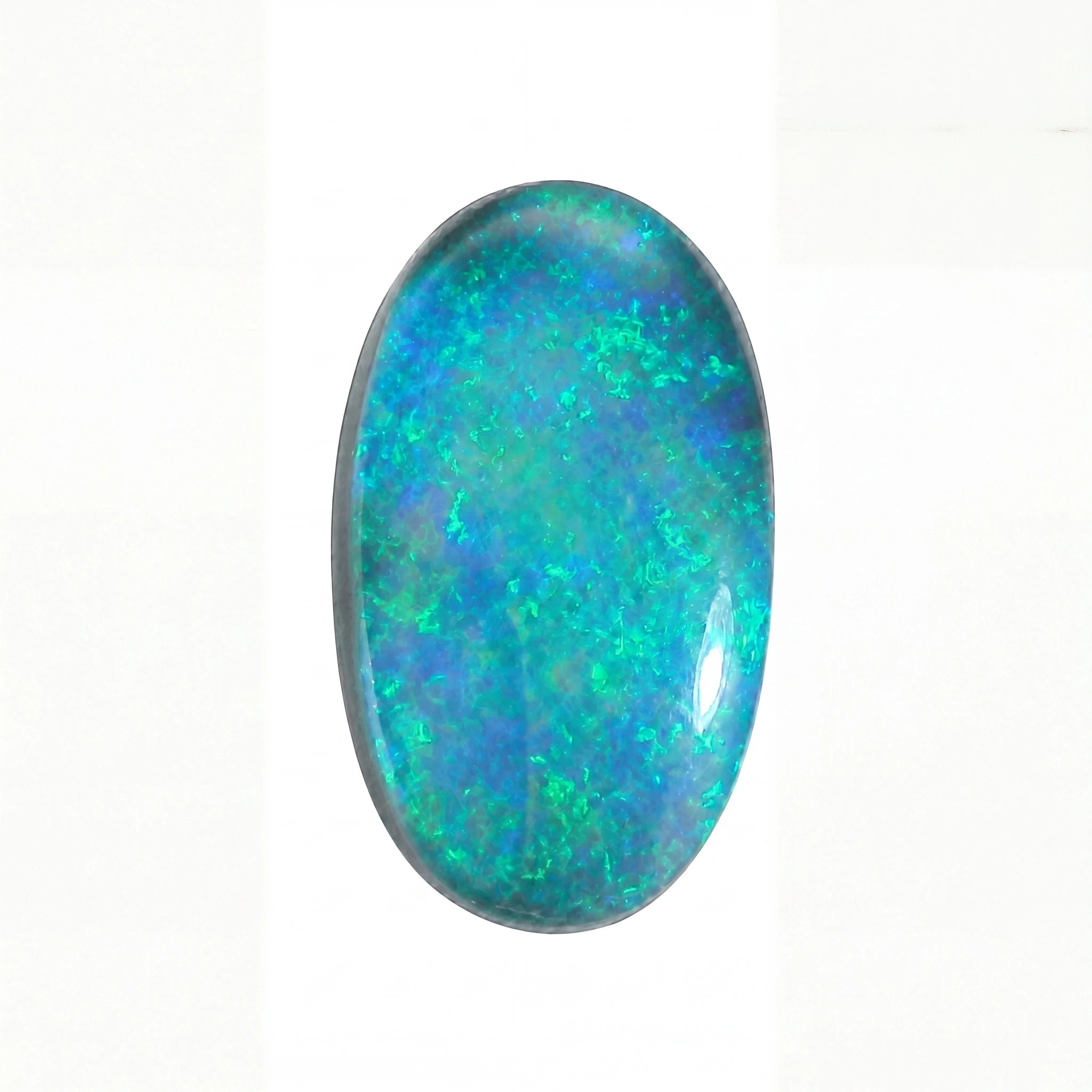A polished oval cabochon gemstone featuring vibrant blue, green, and teal opal play-of-colour, set against a plain white background.