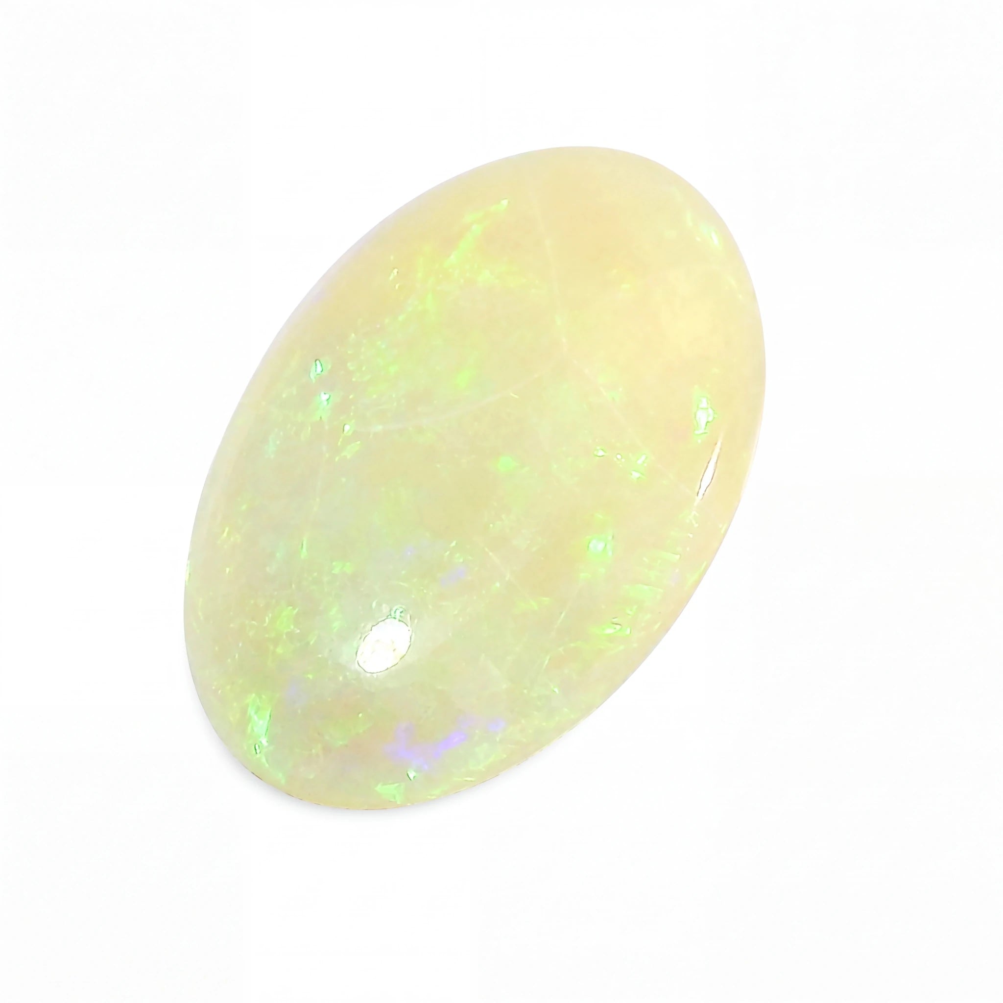 A polished oval cabochon gemstone with a creamy off-white base and vibrant green, blue, and purple iridescent flashes, shown on a plain white background.
