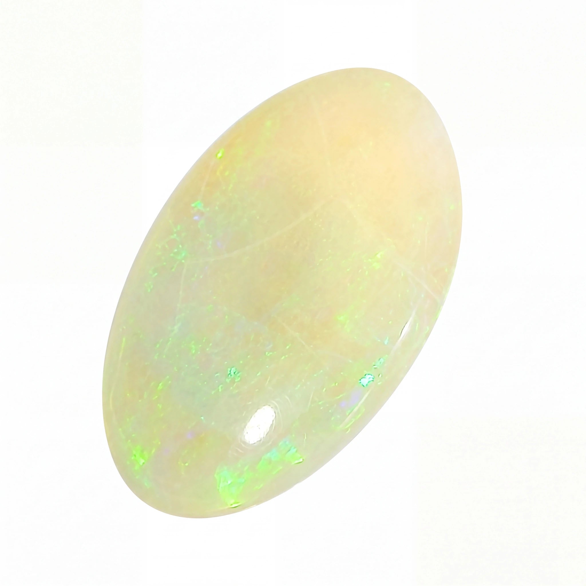 Opal stone with green and white colours on a white background