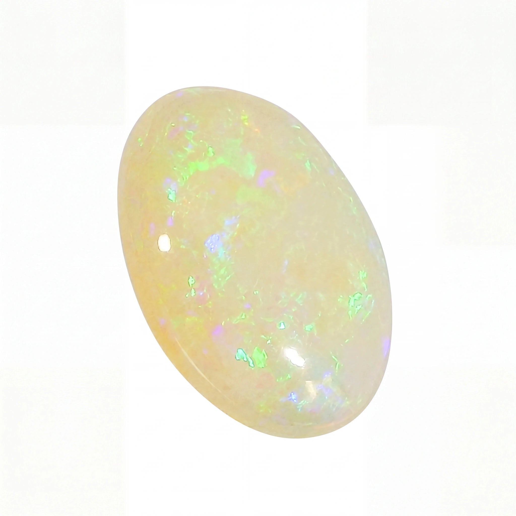 A polished oval cabochon gemstone showing a milky white base with vibrant iridescent flashes of green, blue, and pink, set against a plain white background.