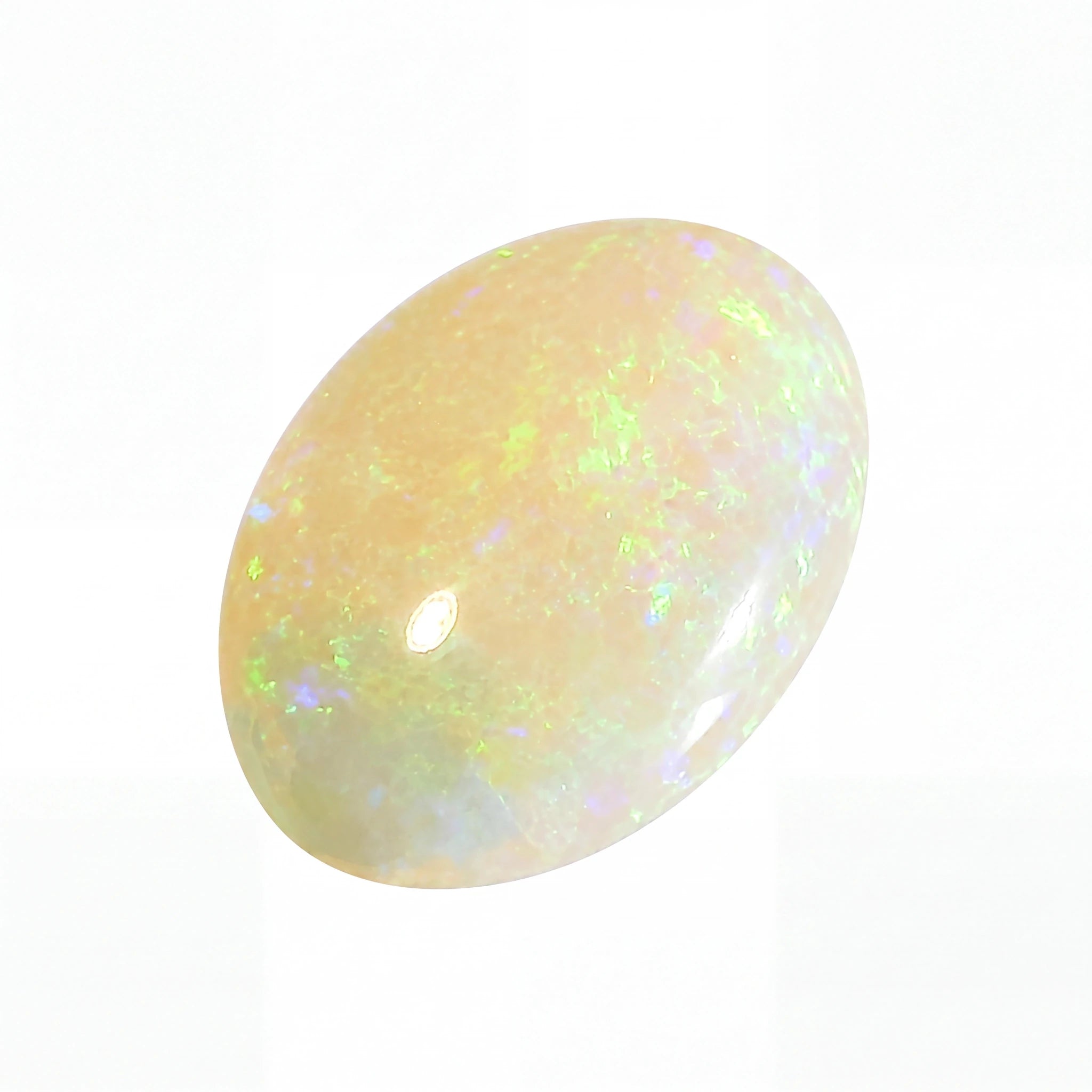 Opal stone with multicolour play of light on a white background