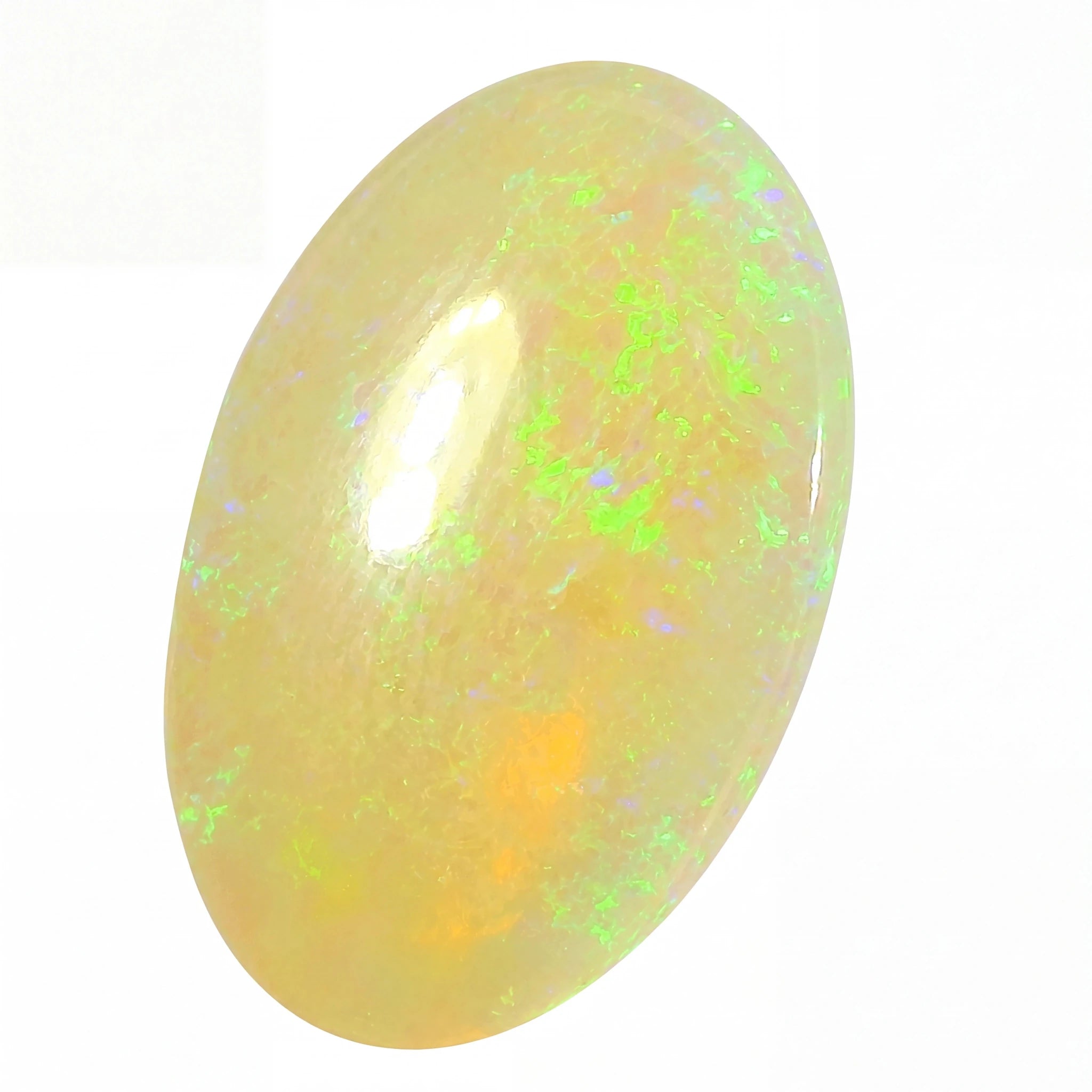 A polished oval cabochon opal gemstone displaying a creamy yellow base with vibrant green and orange flashes, set against a plain white background.
