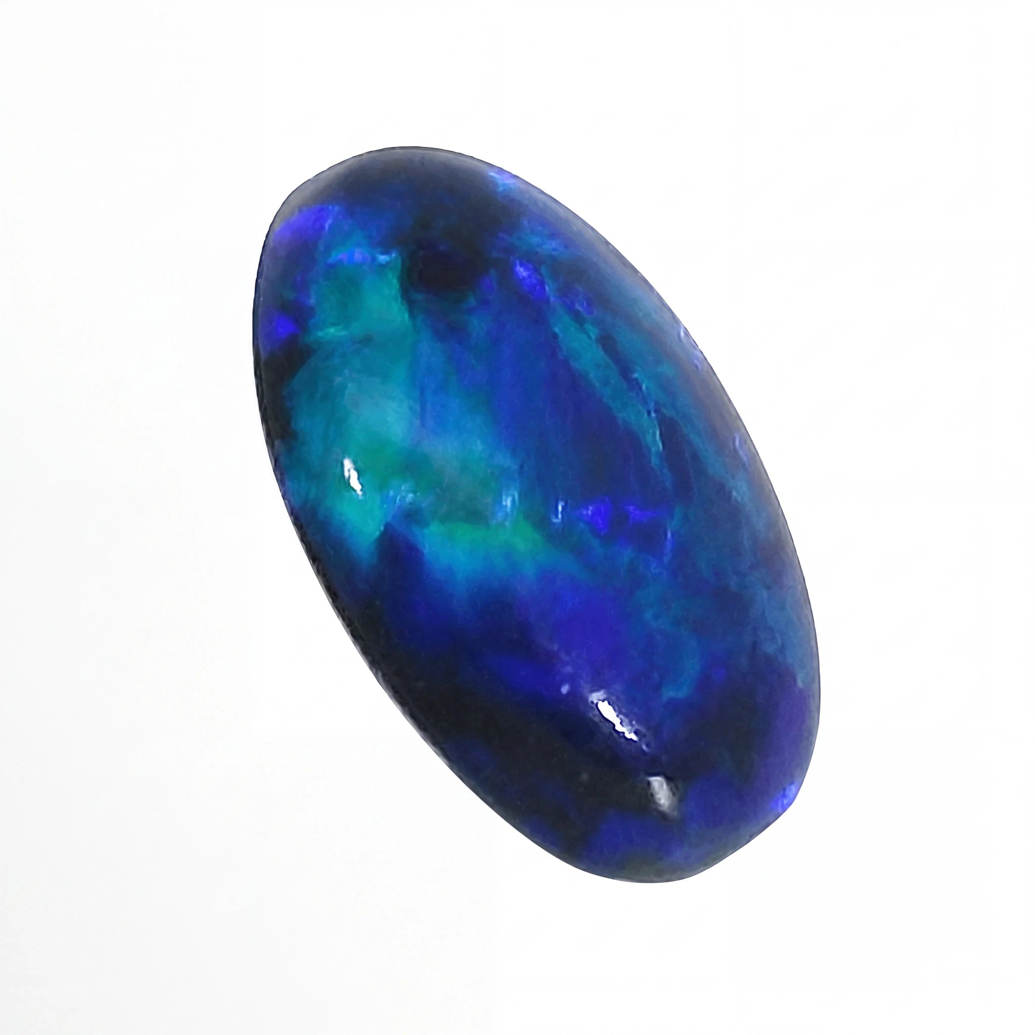 Oval-shaped blue and green gemstone on a white background