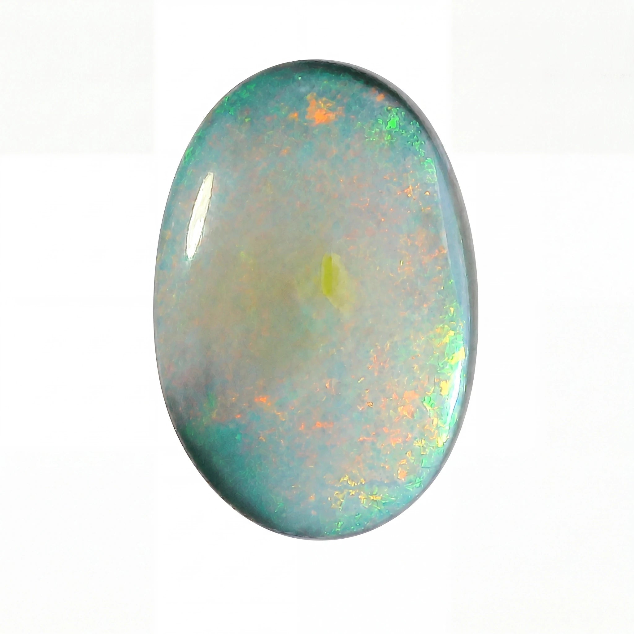 Oval-shaped opal gemstone with multicolour play of light on a white background