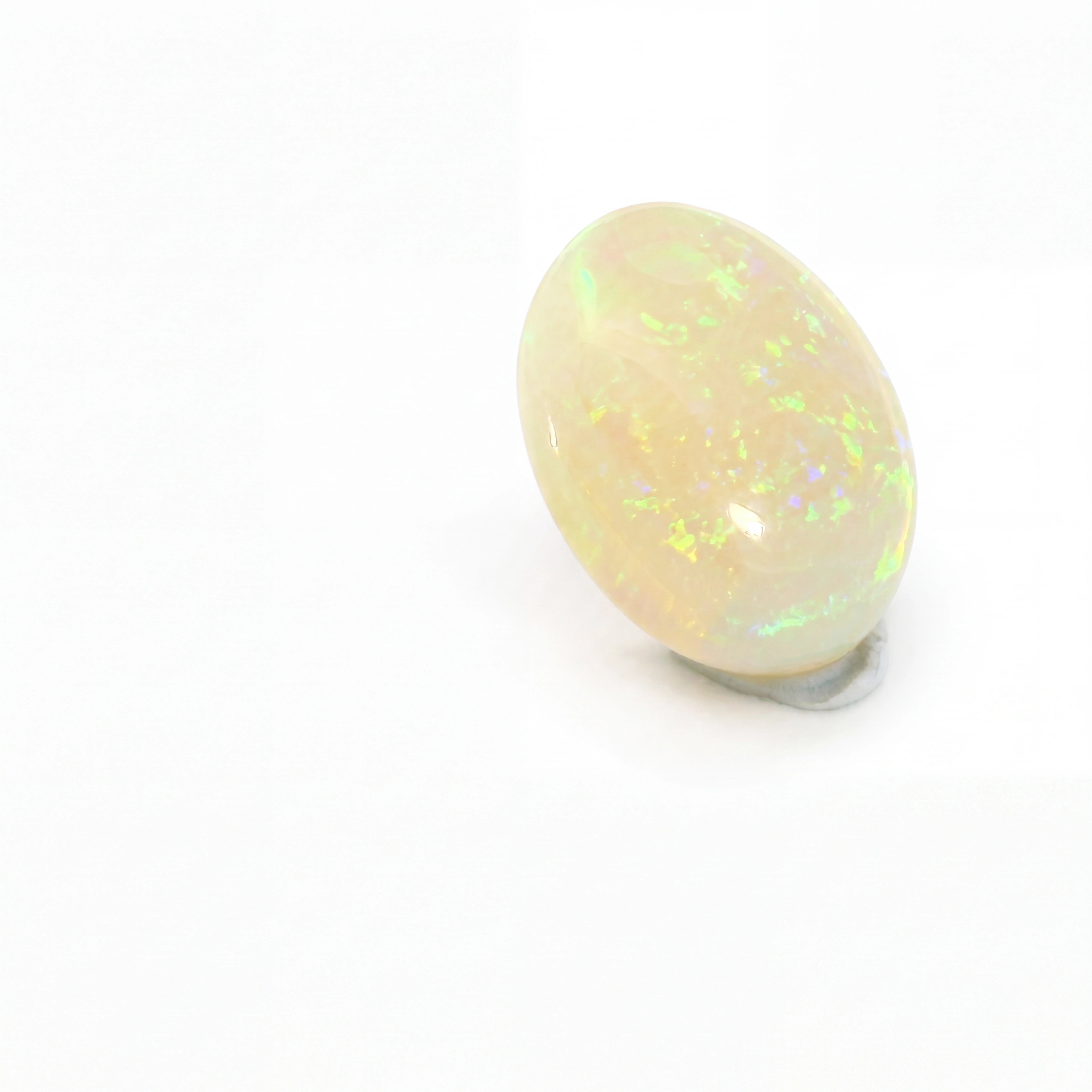 Opal stone on a white background