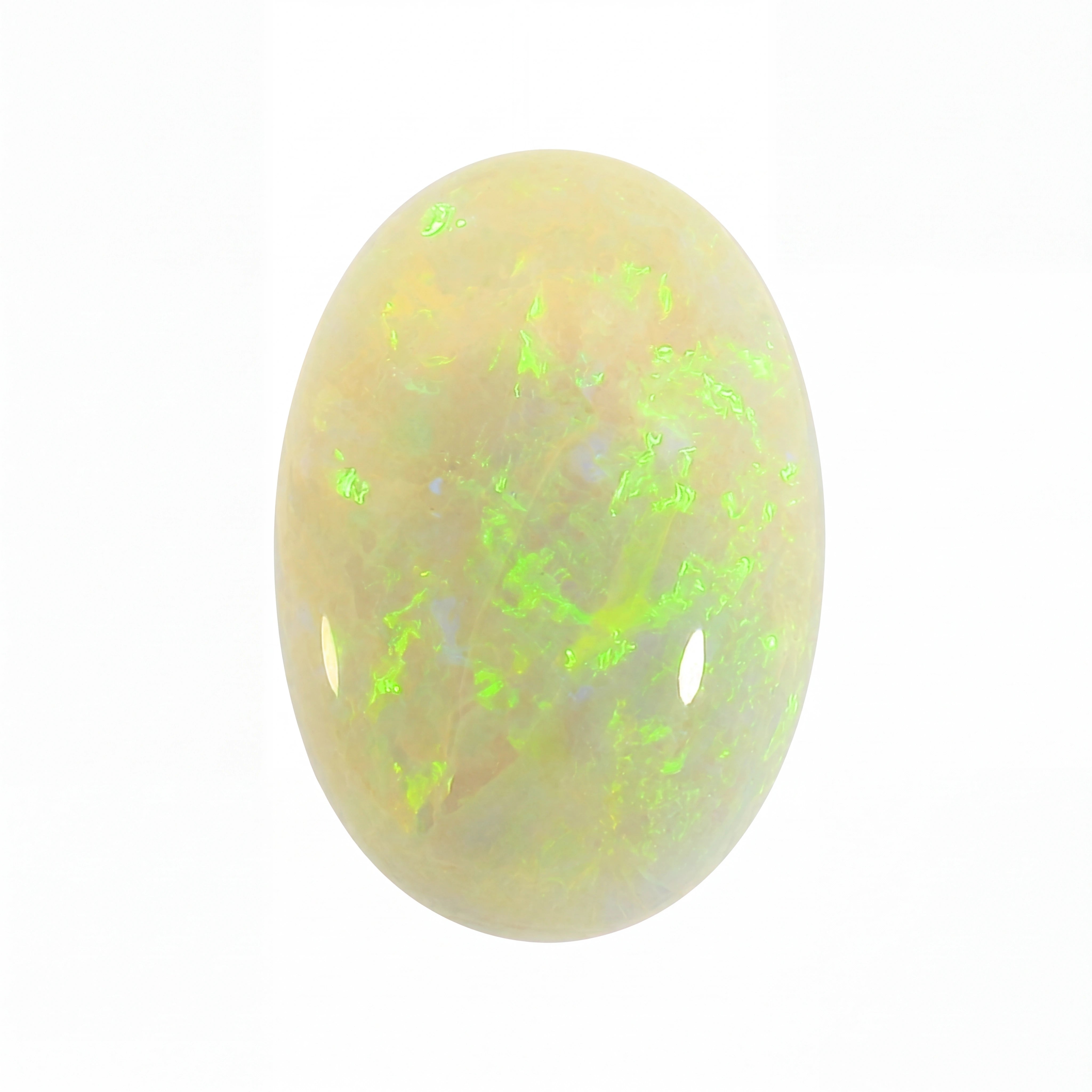 Opal stone with green and yellow fluorescence on a white background