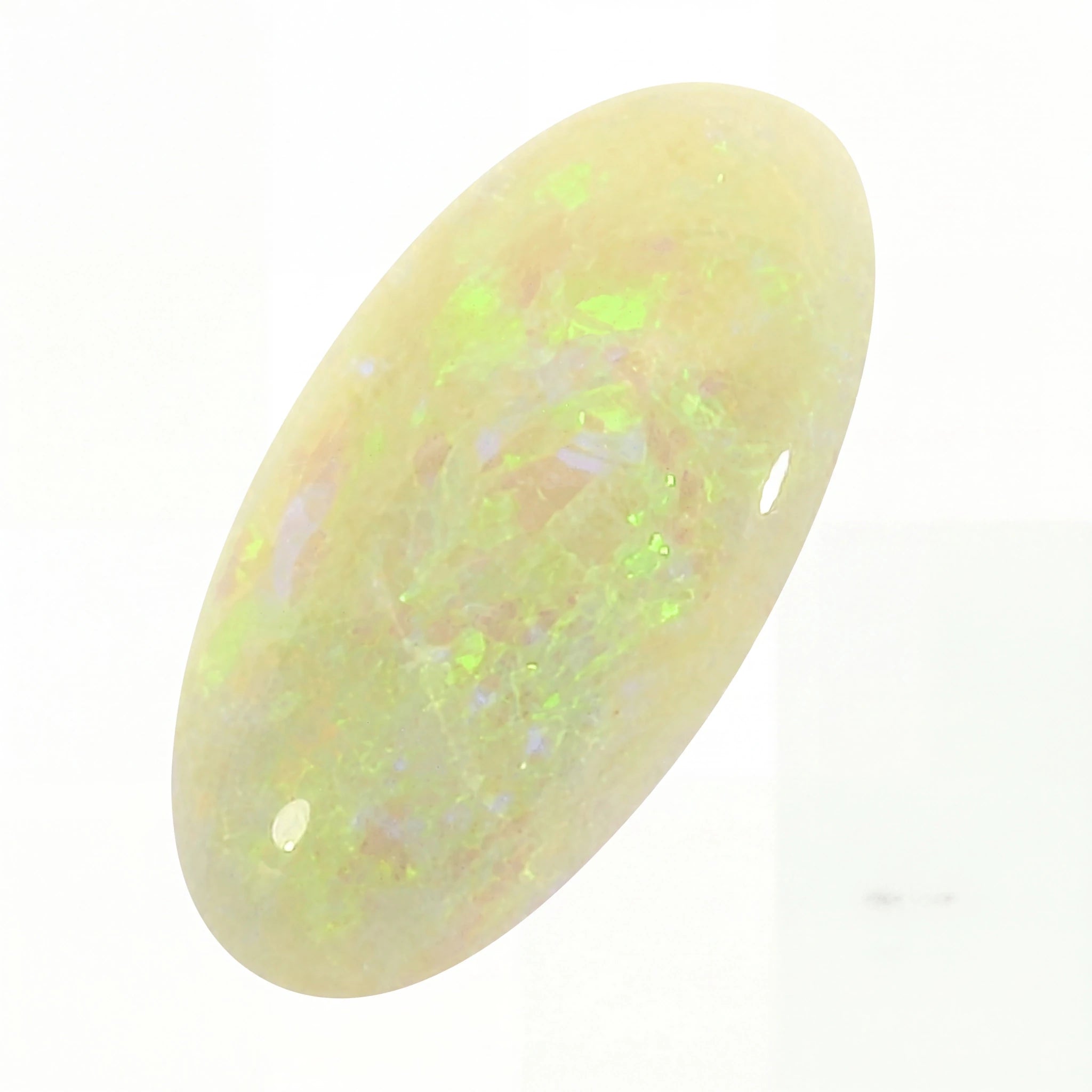 A polished oval cabochon opal gemstone displaying a creamy off-white base with vibrant flashes of neon green, blue, and subtle pink iridescence, set against a plain white background.