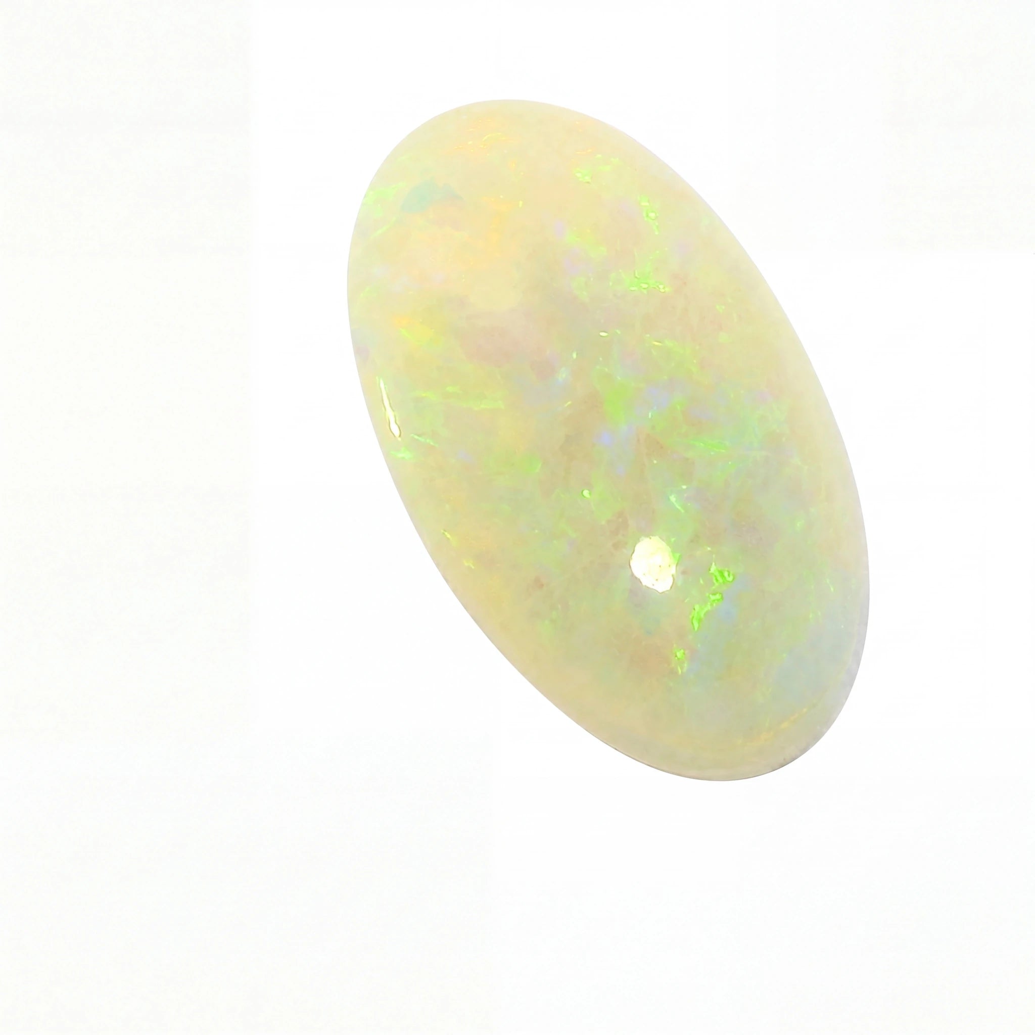 Opal stone with multicoloured play of light on a white background