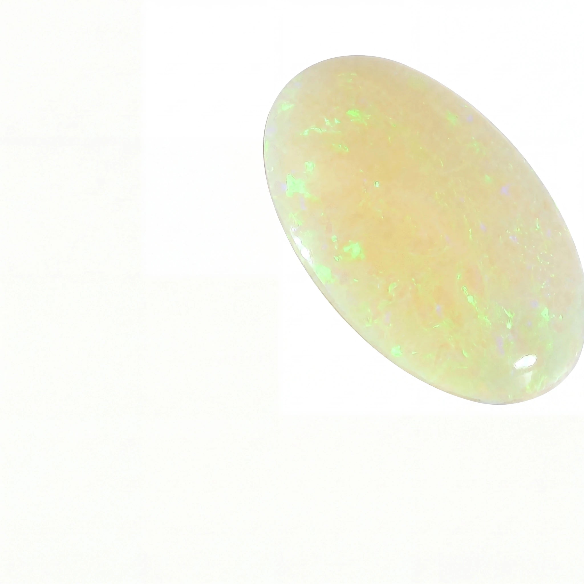 A polished oval cabochon gemstone, likely an opal, featuring a creamy off-white base with vibrant green and light blue flashes, set against a plain white background.