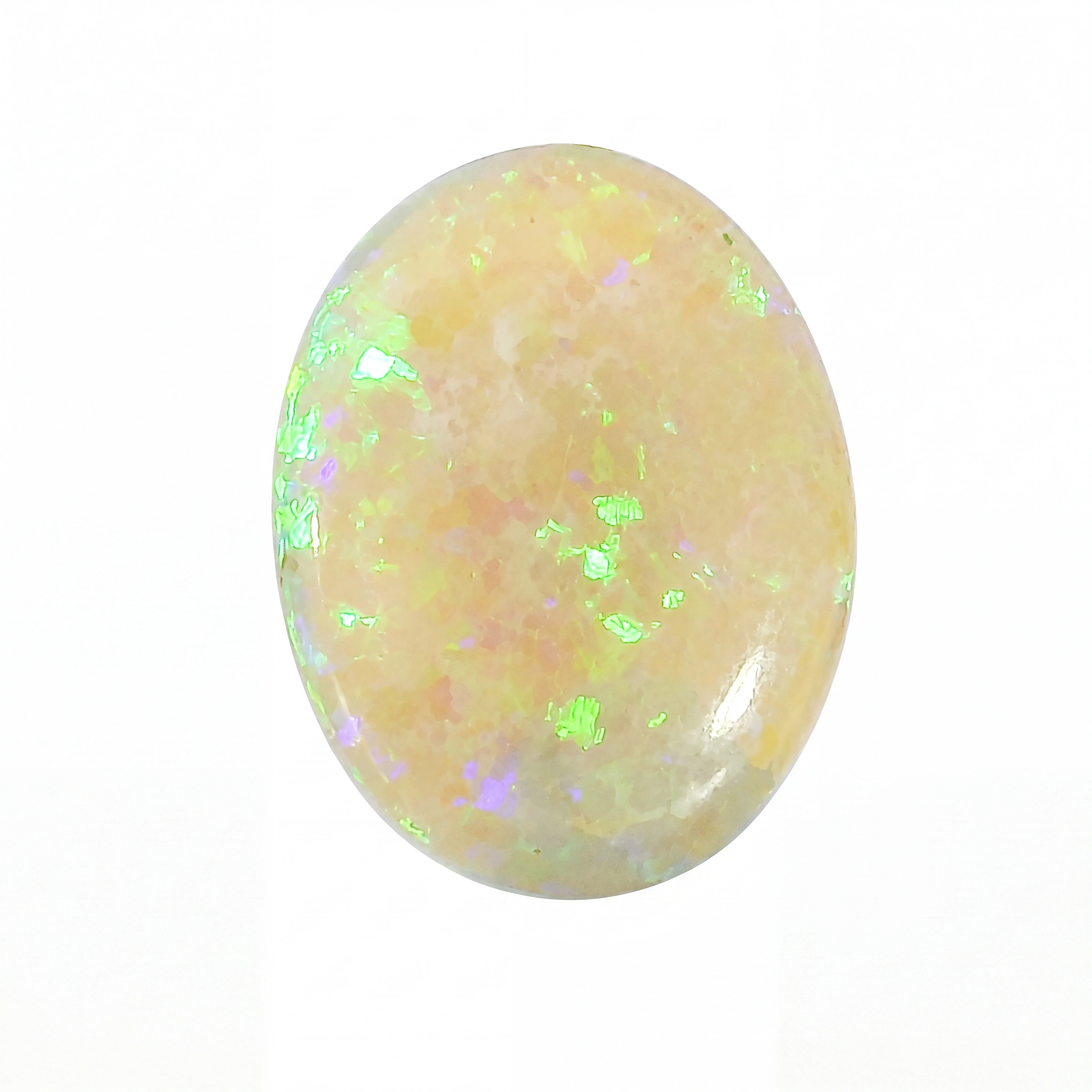 Oval-shaped opal stone with a white background