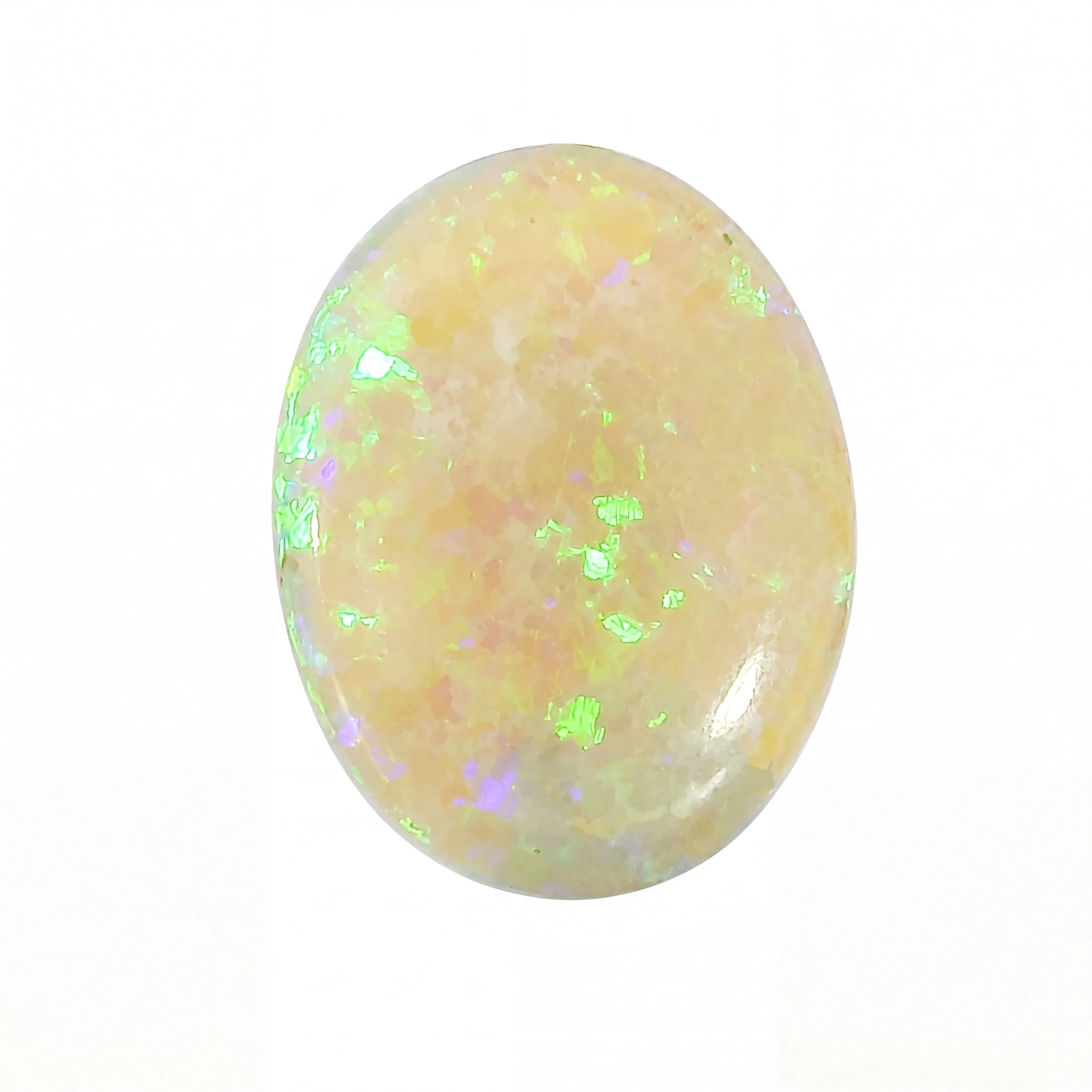 A polished oval cabochon gemstone with a soft peachy-pink base and iridescent flashes of green, blue, and purple, set against a plain white background.