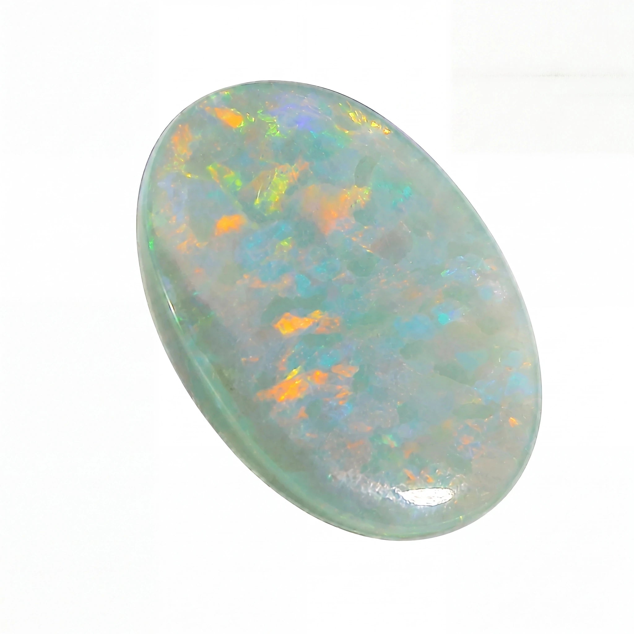 An oval cabochon-cut opal gemstone displaying a play-of-colour with blue, green, orange, and white flashes on a white background.