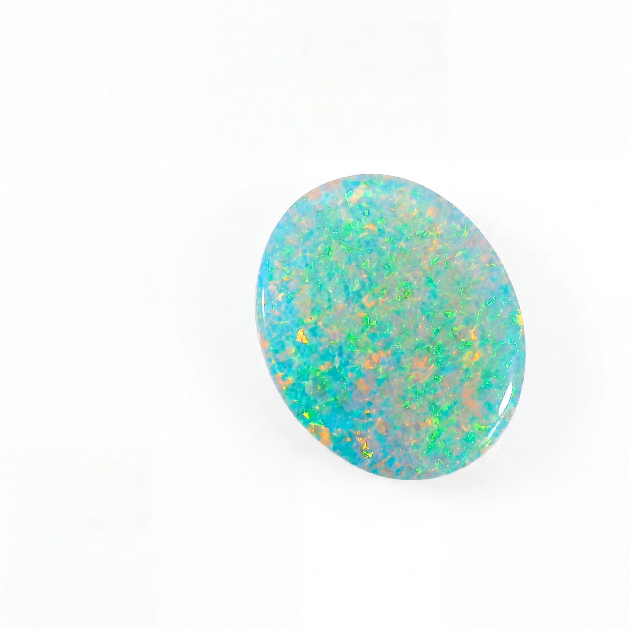 Multicoloured opal stone on a white background