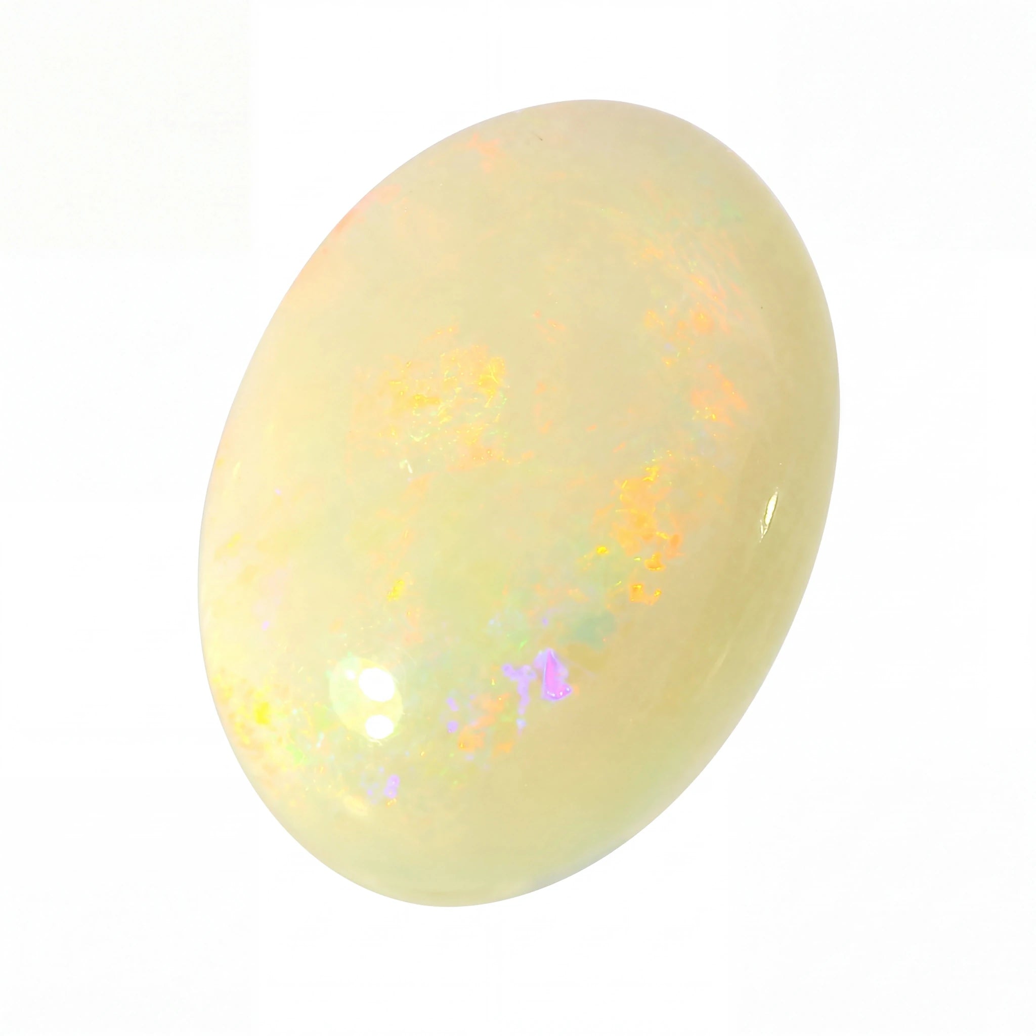 Opal stone with colourful play of light on a white background