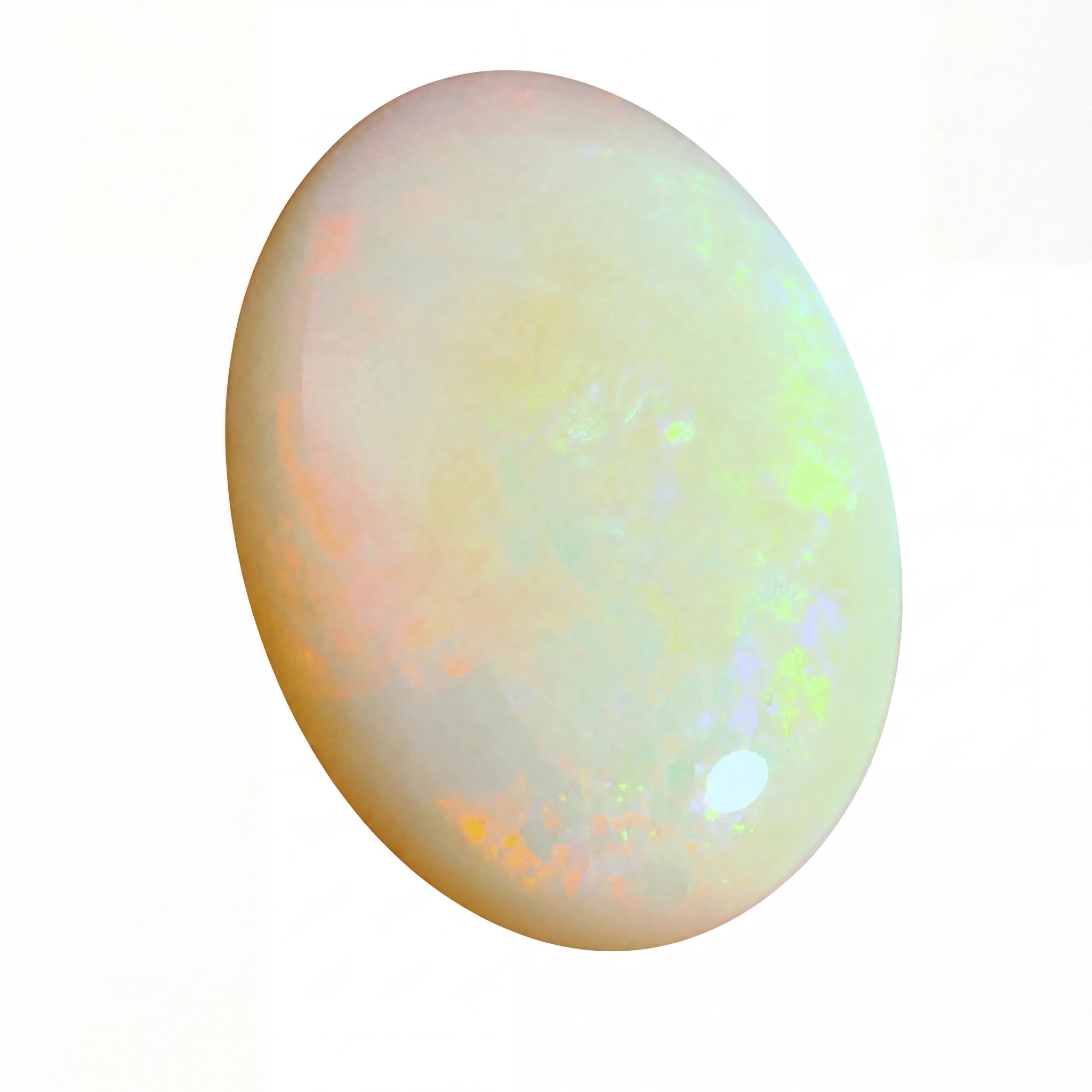 Opal gemstone with multicolour play on a white background
