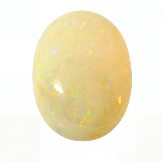 Yellow opal stone with a sparkly surface on a white background