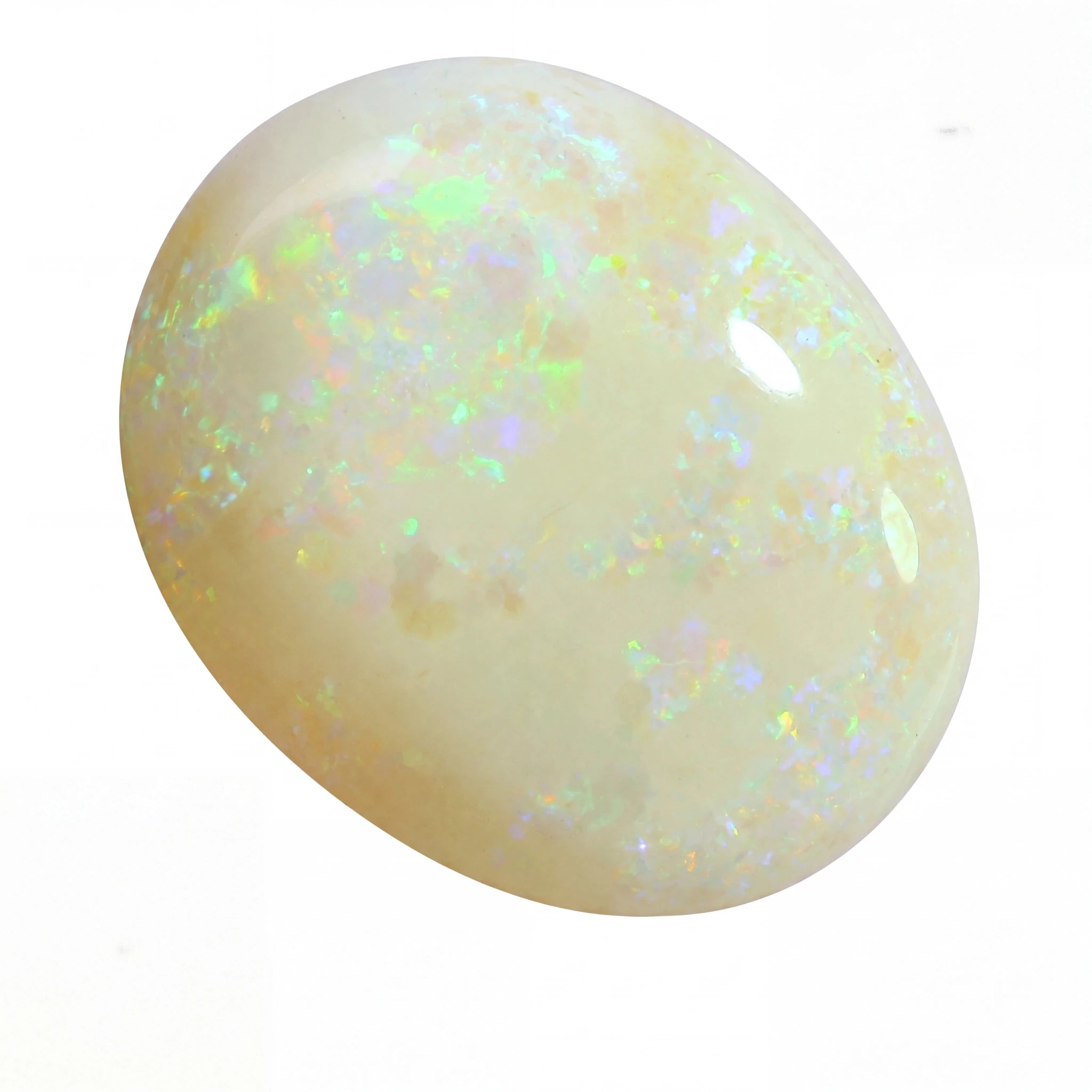 Opal stone with multicoloured flashes on a white background