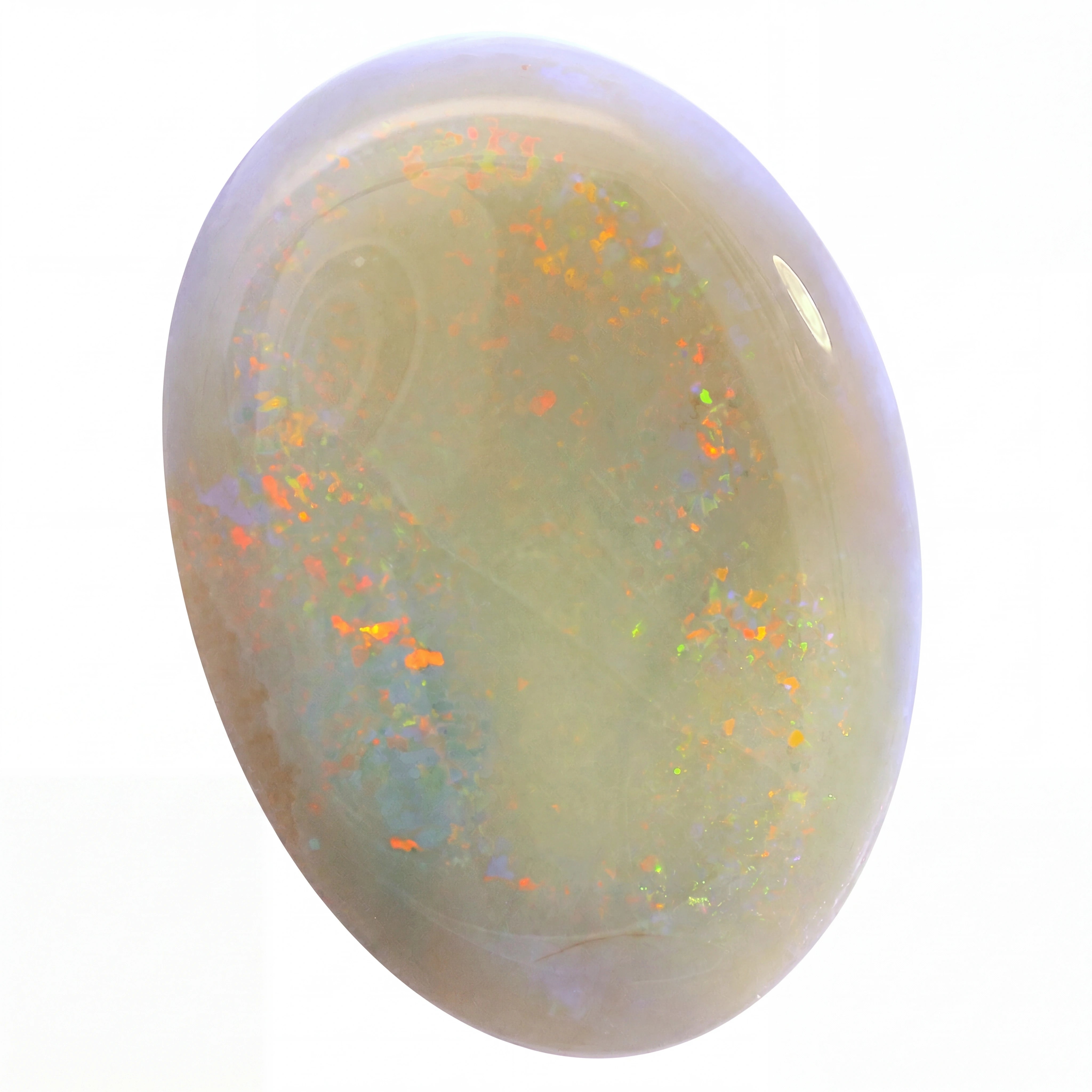 Opal stone with colourful speckles on a white background