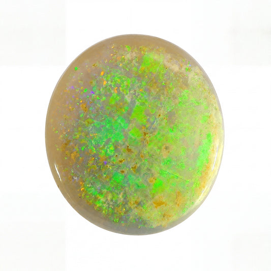 Round opal stone with green and yellow fluorescence on a white background