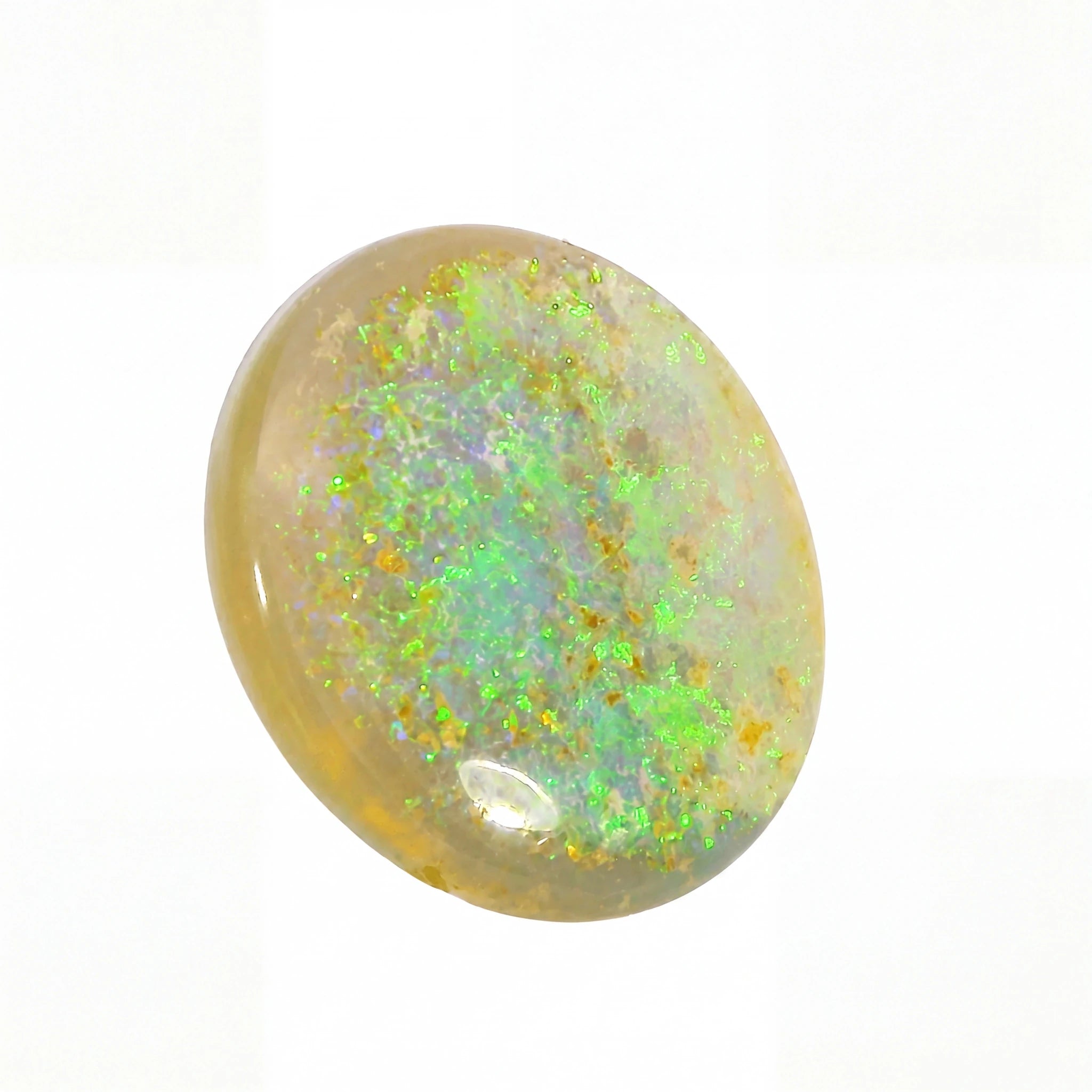 Opal stone with green and yellow fluorescence on a white background