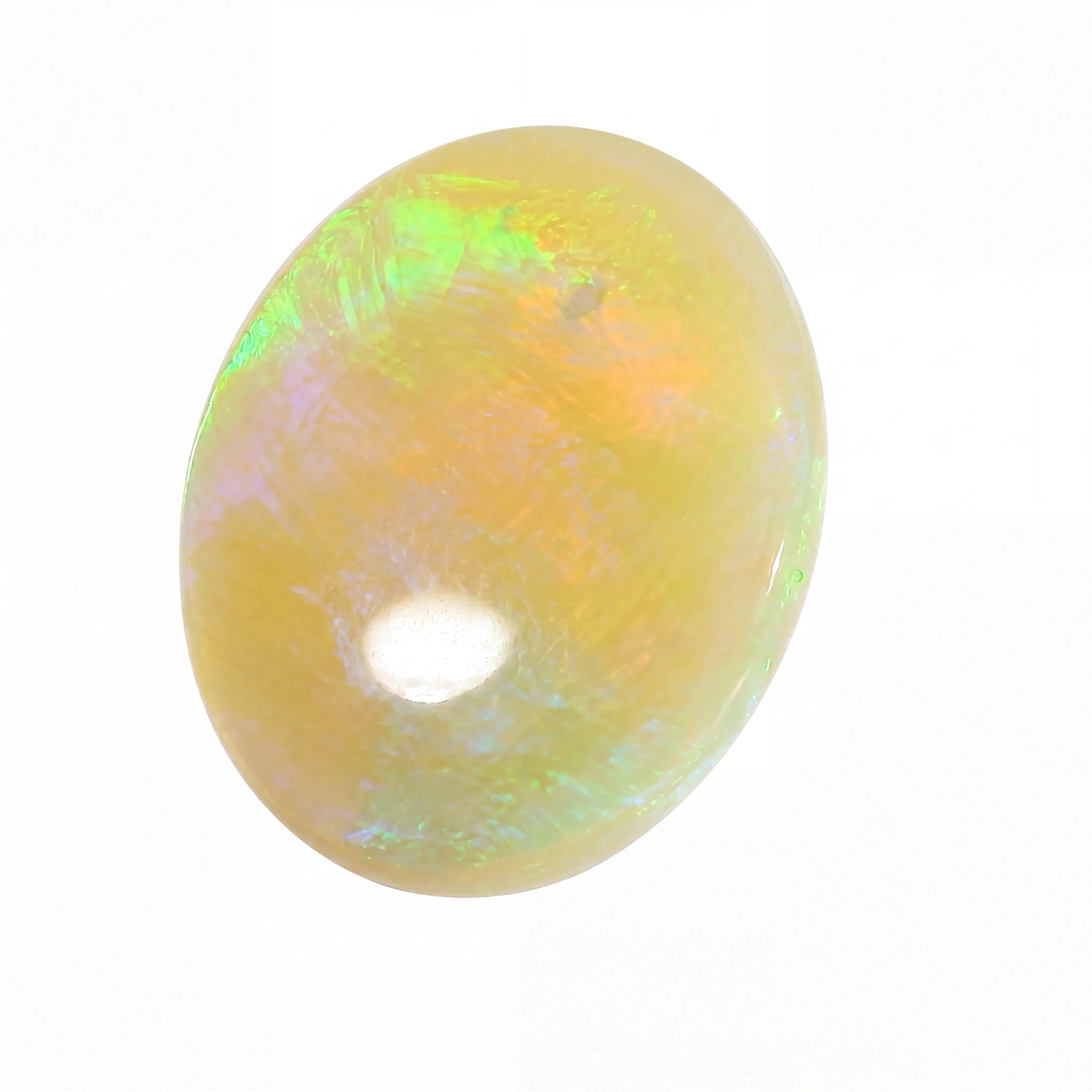 A polished oval cabochon gemstone showing a soft yellow-orange body with iridescent flashes of green, blue, and purple, photographed on a plain white background.